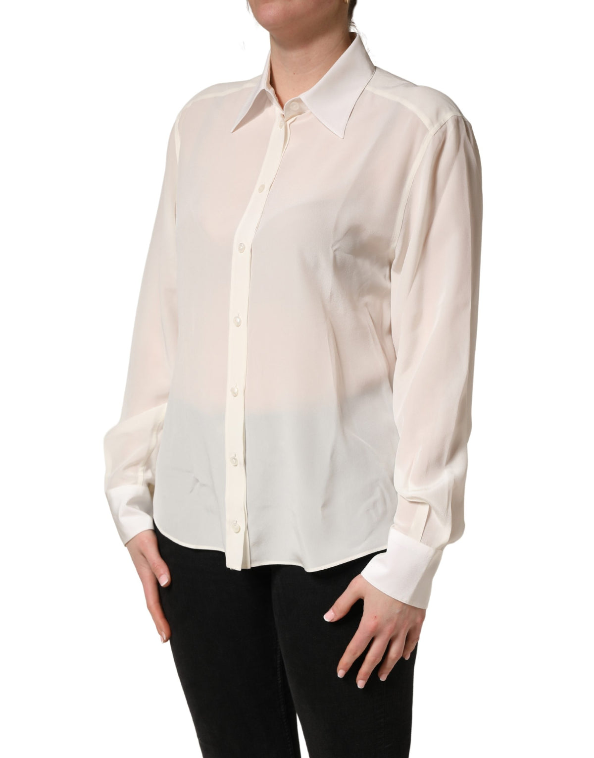 Indulge in the timeless elegance of the Dolce & Gabbana Off White Collared Long Sleeves Blouse, a luxurious silk masterpiece that embodies sophisticated allure and exquisite craftsmanship.