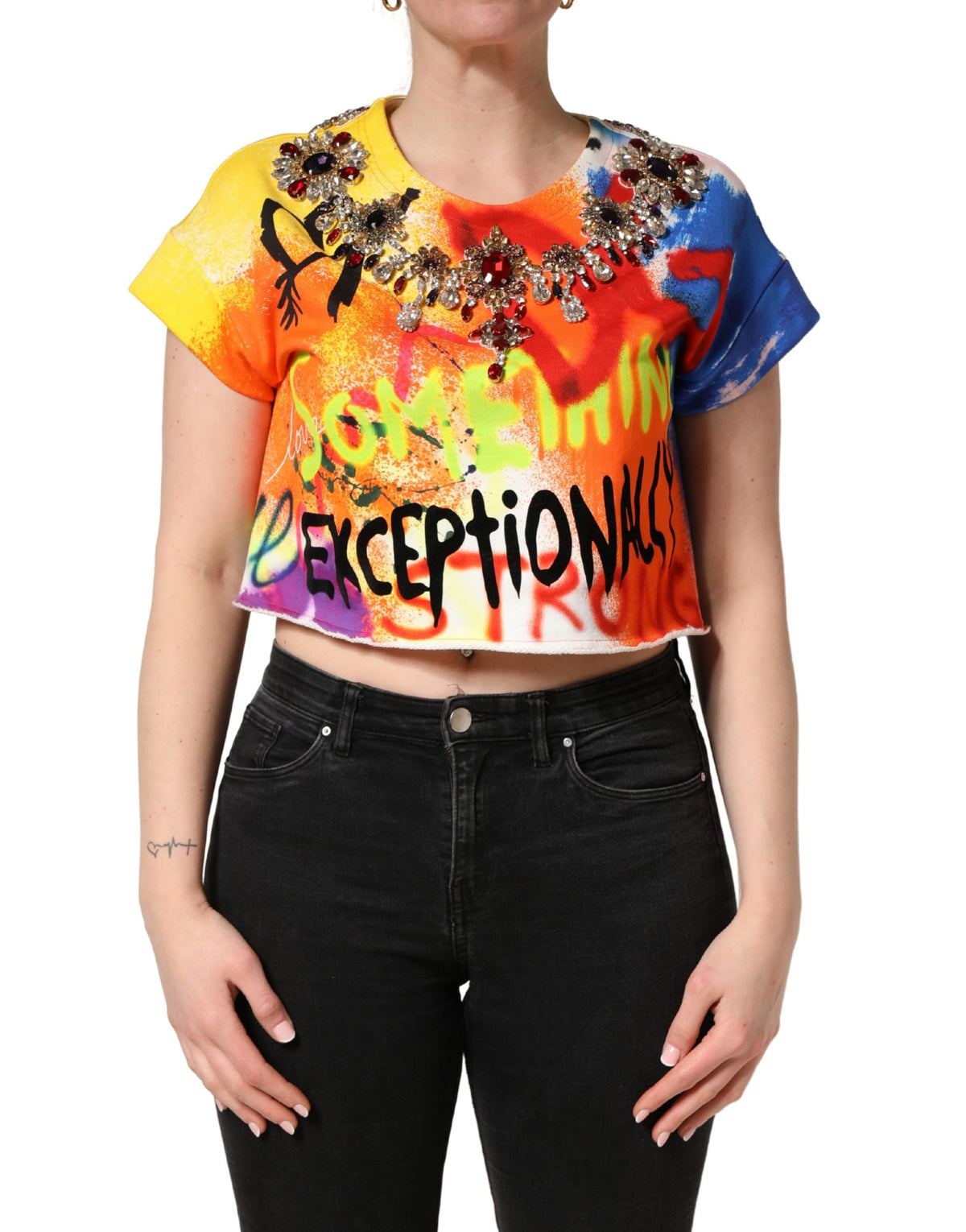 Discover the exquisite Dolce & Gabbana Multicolor Graffiti Crystals Crop Jersey Top, a luxurious blend of 100% cotton and Italian craftsmanship, perfect for elevated summer evenings.