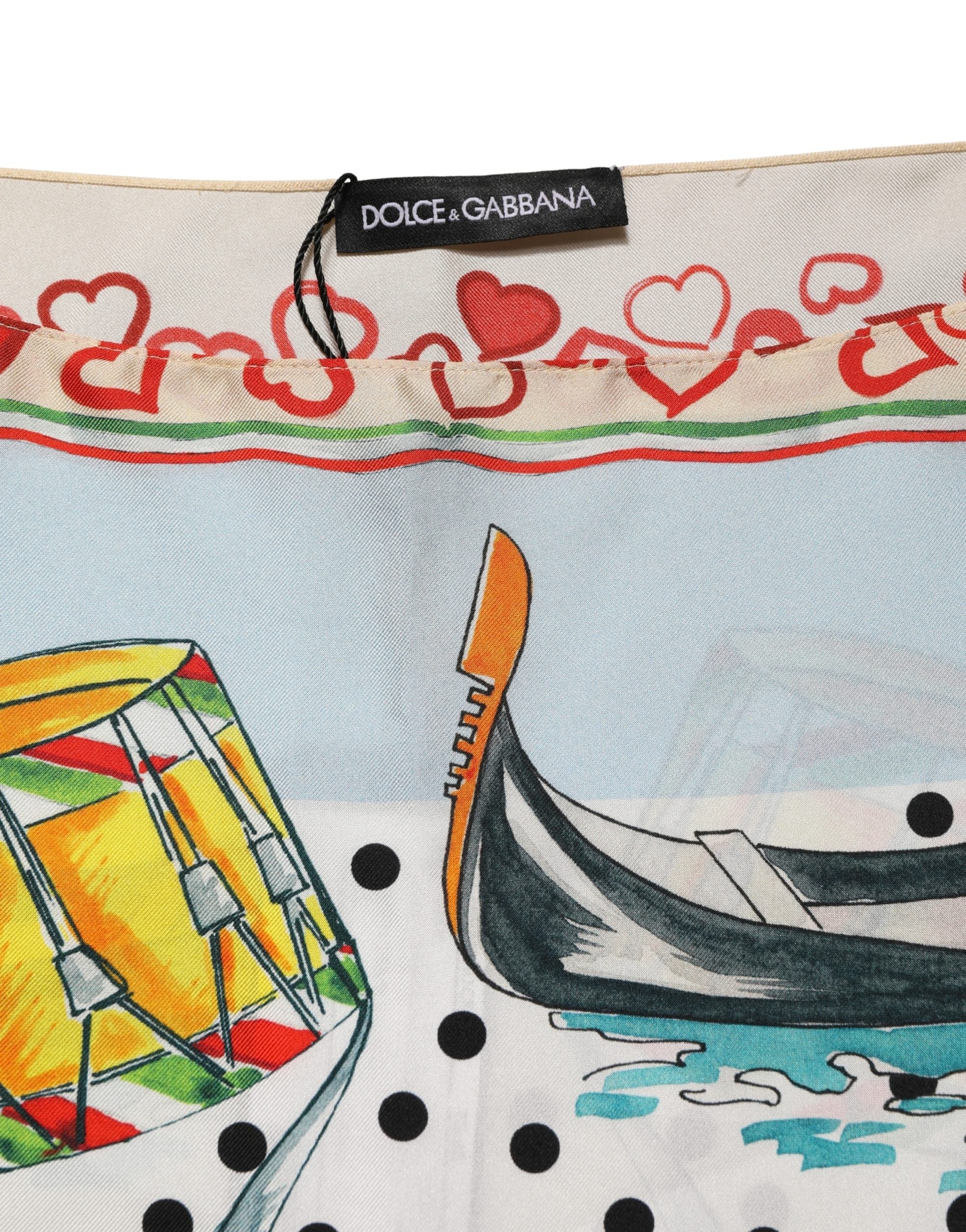 Elevate your wardrobe with the Dolce & Gabbana Multicolor Italy Scenes Graphic Silk Top, a masterpiece of Italian craftsmanship that embodies luxury and artistry.