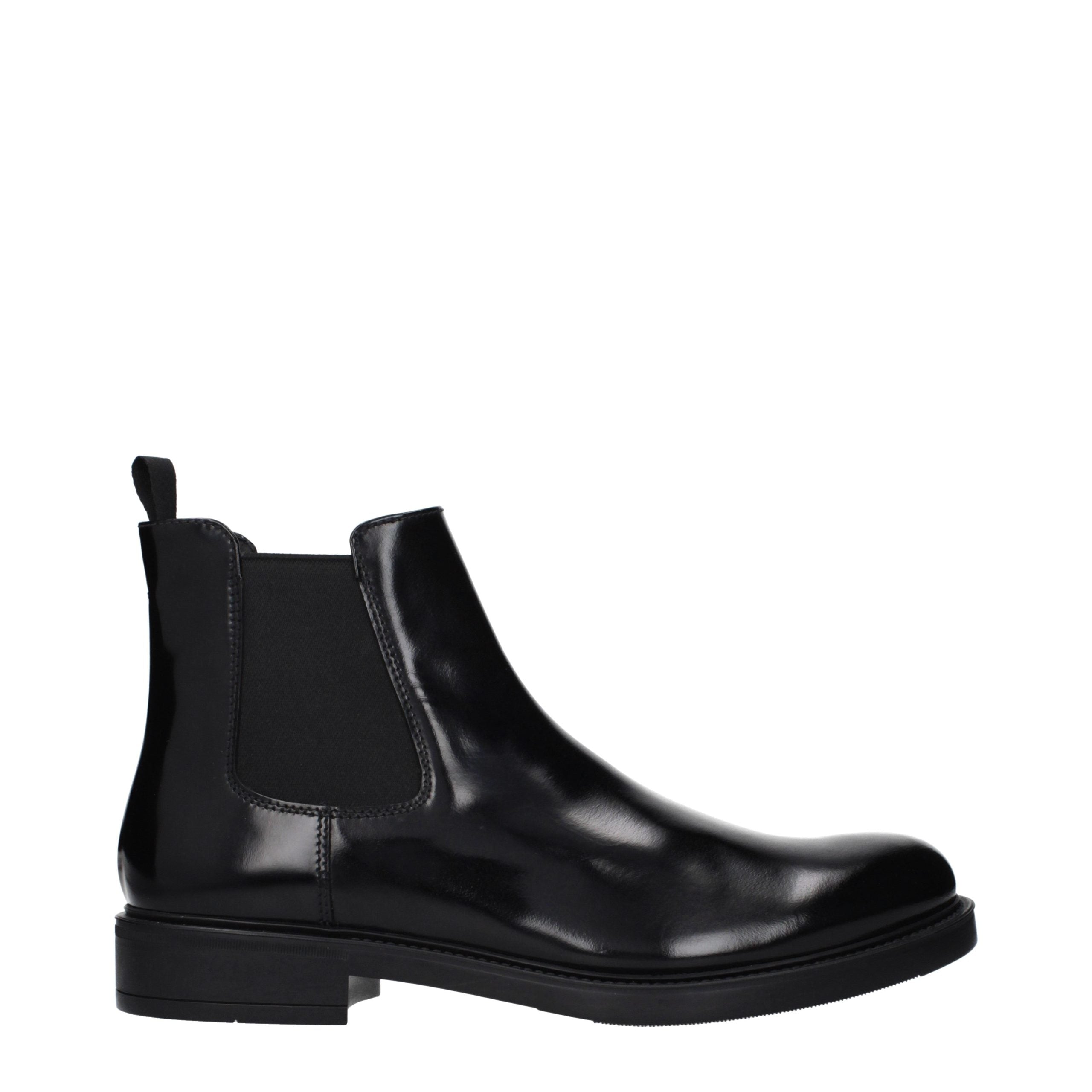 Experience the allure of Prada Black Leather Ankle Boots, where exquisite Italian craftsmanship meets timeless elegance, elevating your style to new heights.