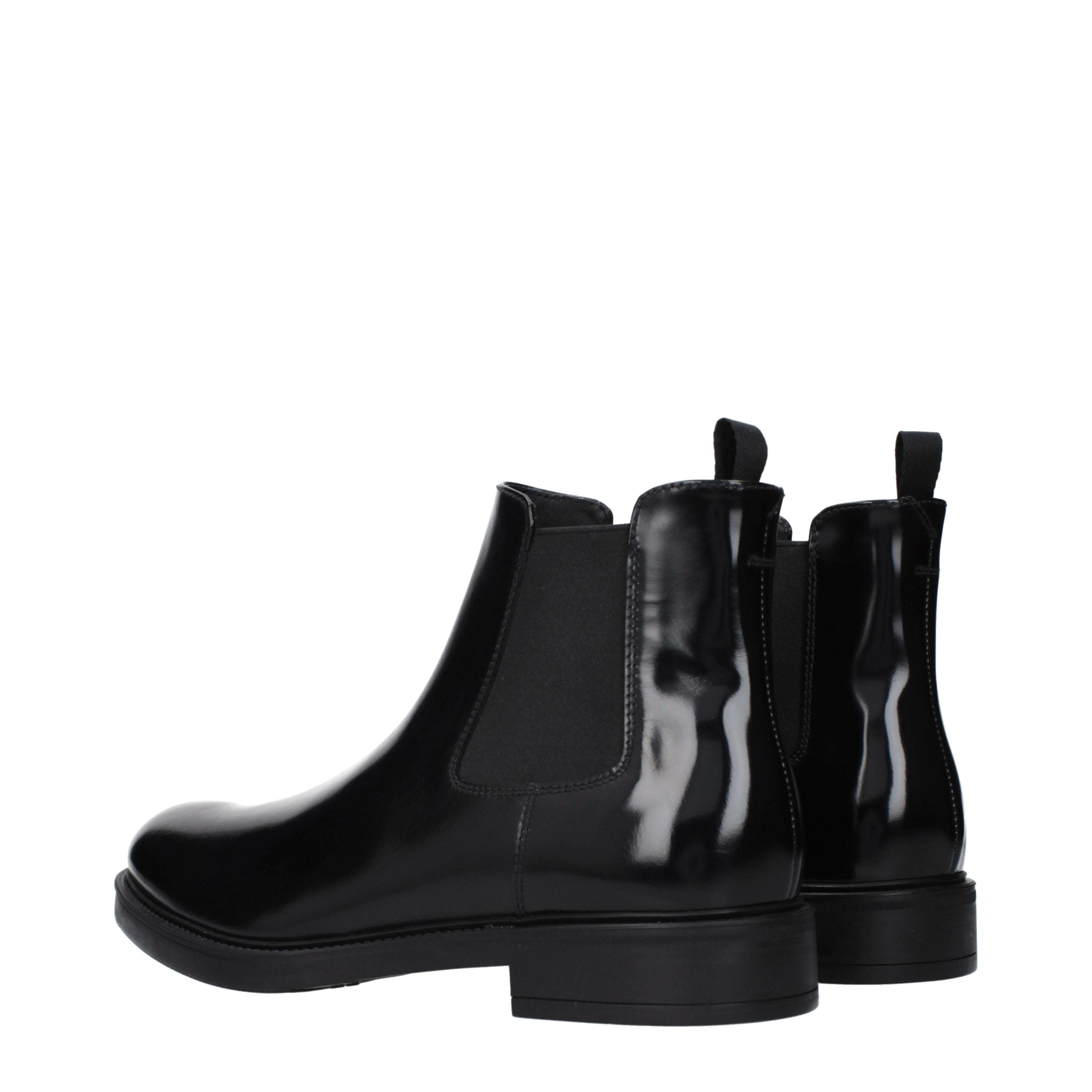 Discover the Prada Black Leather Ankle Boots, a masterpiece of Italian craftsmanship that embodies luxury and sophistication for the discerning individual.