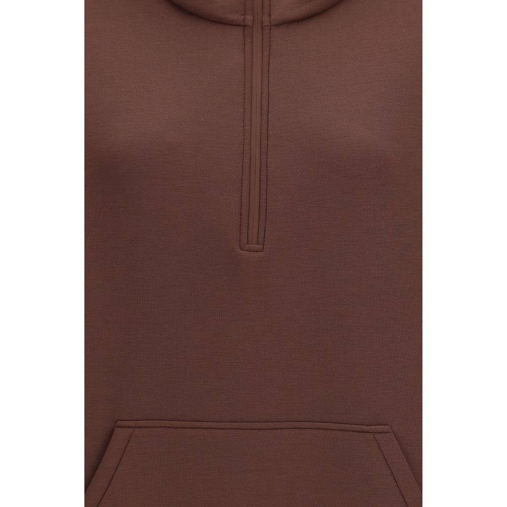 Indulge in the luxurious Max Mara Brown Modal Sweatshirt, expertly crafted from a sumptuous modal blend, redefining contemporary elegance for the discerning wardrobe.