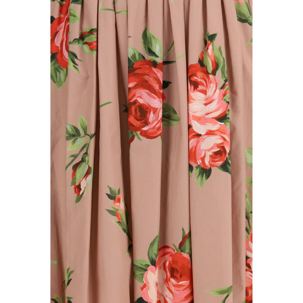 Elevate your wardrobe with the Dolce & Gabbana Multicolor Cotton Casual Dress, a masterpiece of luxury cotton adorned with enchanting rose prints, perfect for any sophisticated occasion.