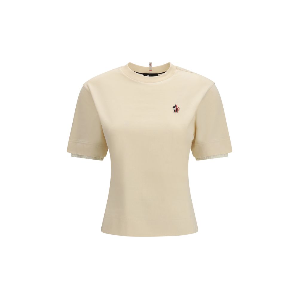 Elevate your wardrobe with the Moncler Grenoble Beige Cotton T-Shirt, a luxurious blend of style and comfort crafted from superior 100% cotton for timeless elegance.