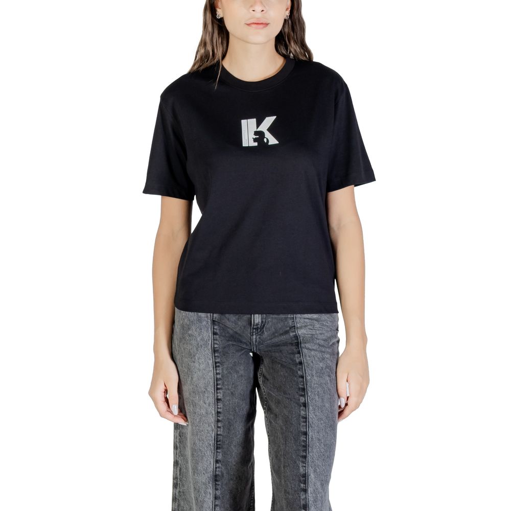 Indulge in the Karl Lagerfeld Black Cotton T-Shirt, a luxurious blend of comfort and sophistication, perfect for elevating any wardrobe with timeless elegance.