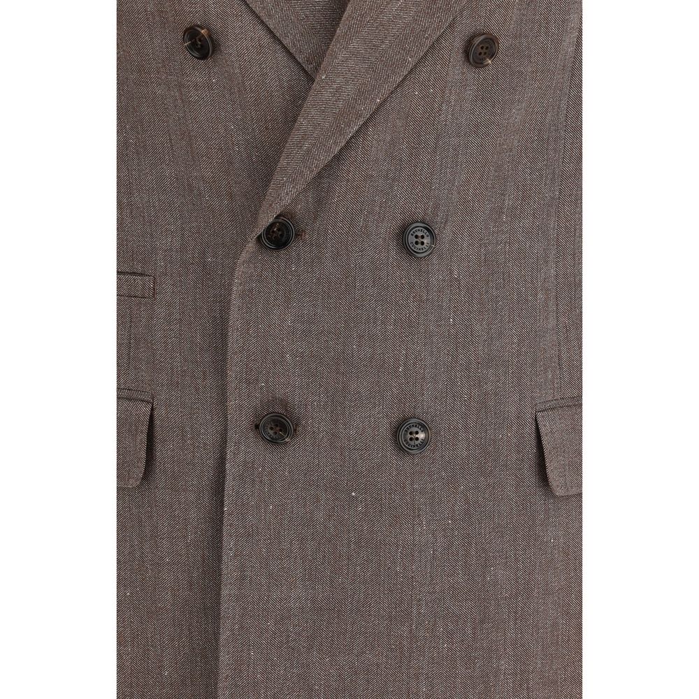 Discover the Brunello Cucinelli Brown Linen Blazer, an exquisite blend of linen and wool, embodying artisanal elegance and timeless sophistication for the discerning individual.