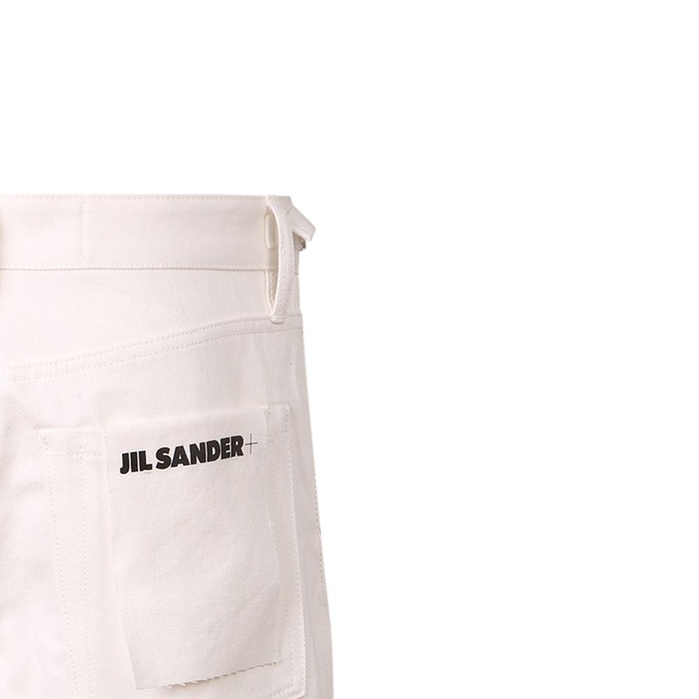 Elevate your wardrobe with the Jil Sander White Cotton Knee Length, a masterpiece of luxurious cotton that embodies sophistication and timeless elegance for the discerning individual.