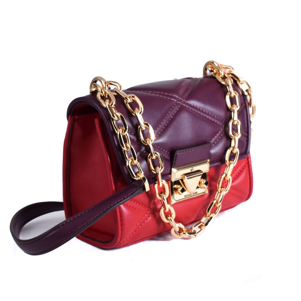 Discover the Michael Kors Multicolor Leather Handbag, a masterpiece of exquisite craftsmanship and vibrant elegance, perfect for those who embody luxury and sophistication.