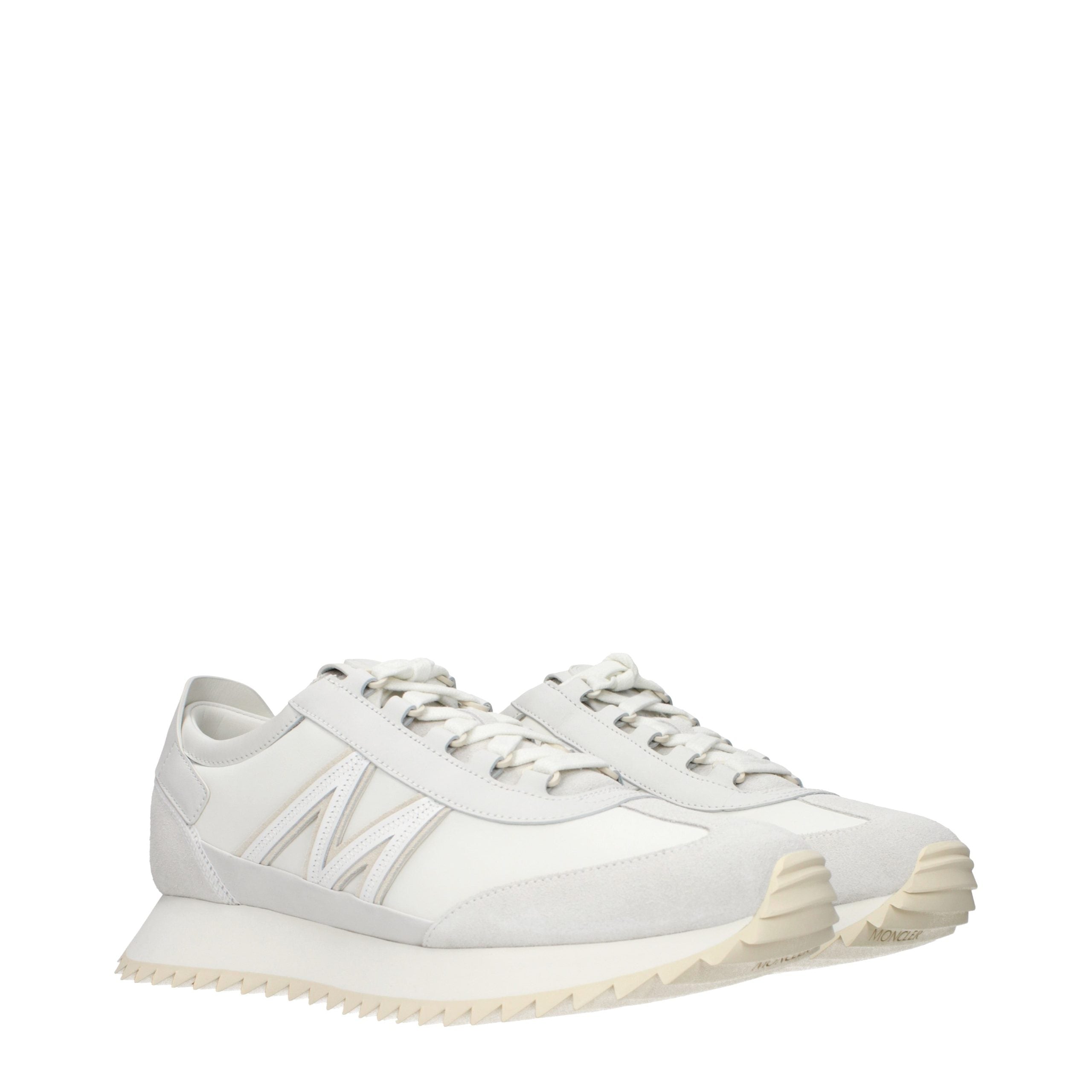 Experience the exquisite craftsmanship of Moncler White Leather Athletic Sneakers, where luxurious leather meets timeless elegance for the discerning individual.