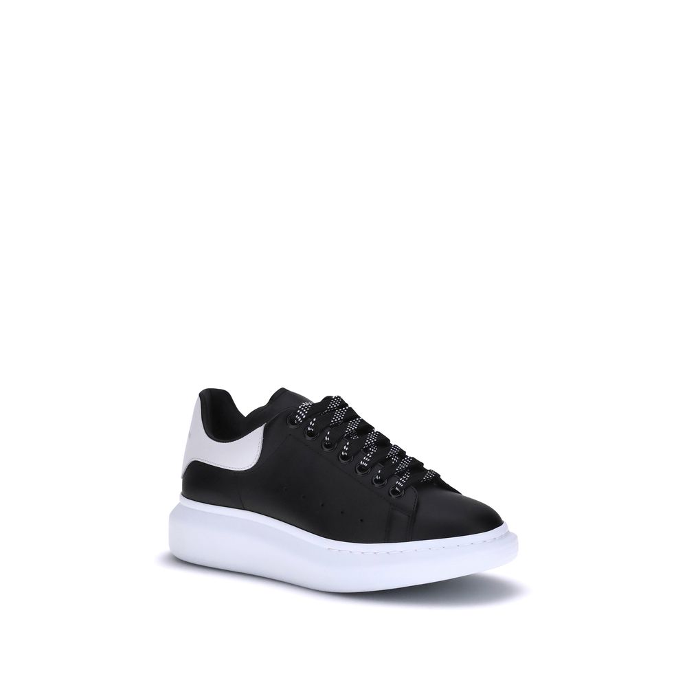 Experience the allure of Alexander McQueen's Black Calf Leather Bos Taurus Platform Sneakers, where exquisite craftsmanship meets luxurious design for a bold statement in every step.