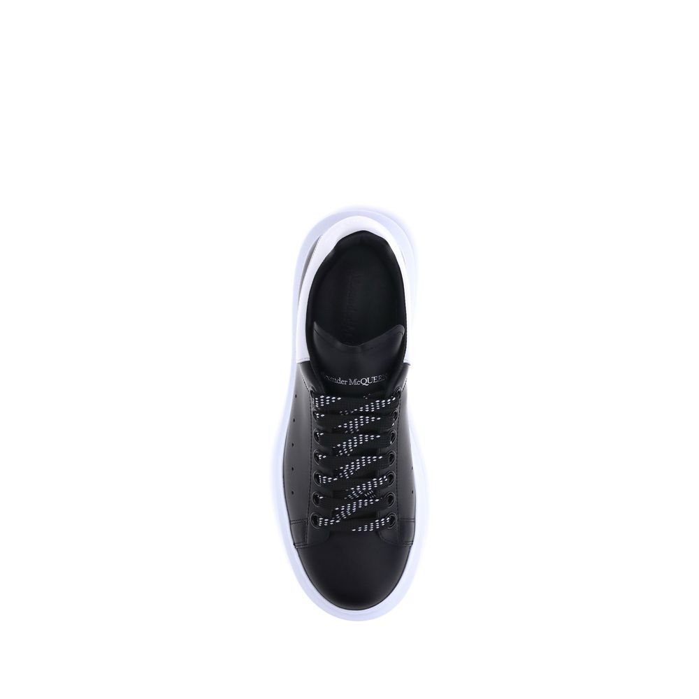 Elevate your style with Alexander McQueen's Black Calf Leather Bos Taurus Platform Sneakers, a masterpiece of exquisite craftsmanship and iconic design, perfect for the discerning fashion connoisseur.