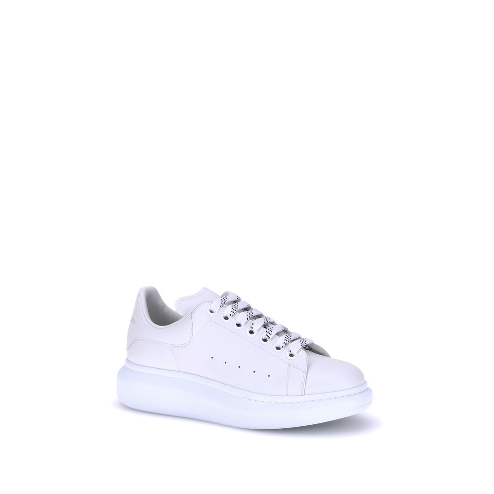 Elevate your style with Alexander McQueen's White Calf Leather Bos Taurus Platform Sneakers, where exquisite craftsmanship meets modern luxury for the discerning individual.