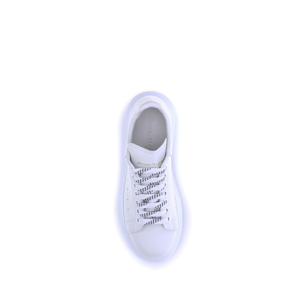 Elevate your style with Alexander McQueen's White Calf Leather Bos Taurus Platform Sneakers, where exquisite craftsmanship meets modern luxury for the discerning individual.