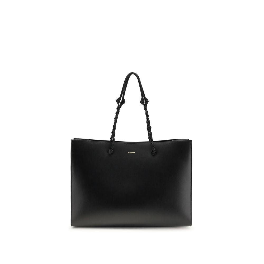Discover the Jil Sander Black Calf Leather Bos Taurus Shoulder Bag, a masterpiece of minimalist luxury and exquisite craftsmanship, perfect for the discerning connoisseur.