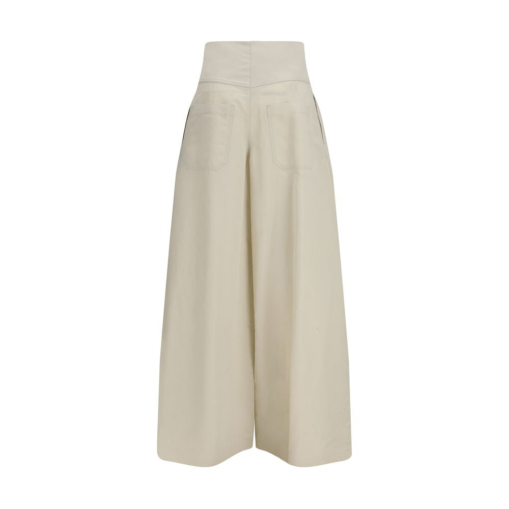 Elevate your wardrobe with Brunello Cucinelli Beige Cotton Pants, a masterpiece of luxurious craftsmanship blending cotton and copper for timeless elegance and refined allure.