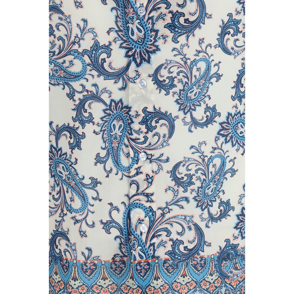 Elevate your wardrobe with the Etro Blue Cotton Pattern Shirt, a luxurious blend of floral elegance and modern sophistication, perfect for any discerning style connoisseur.