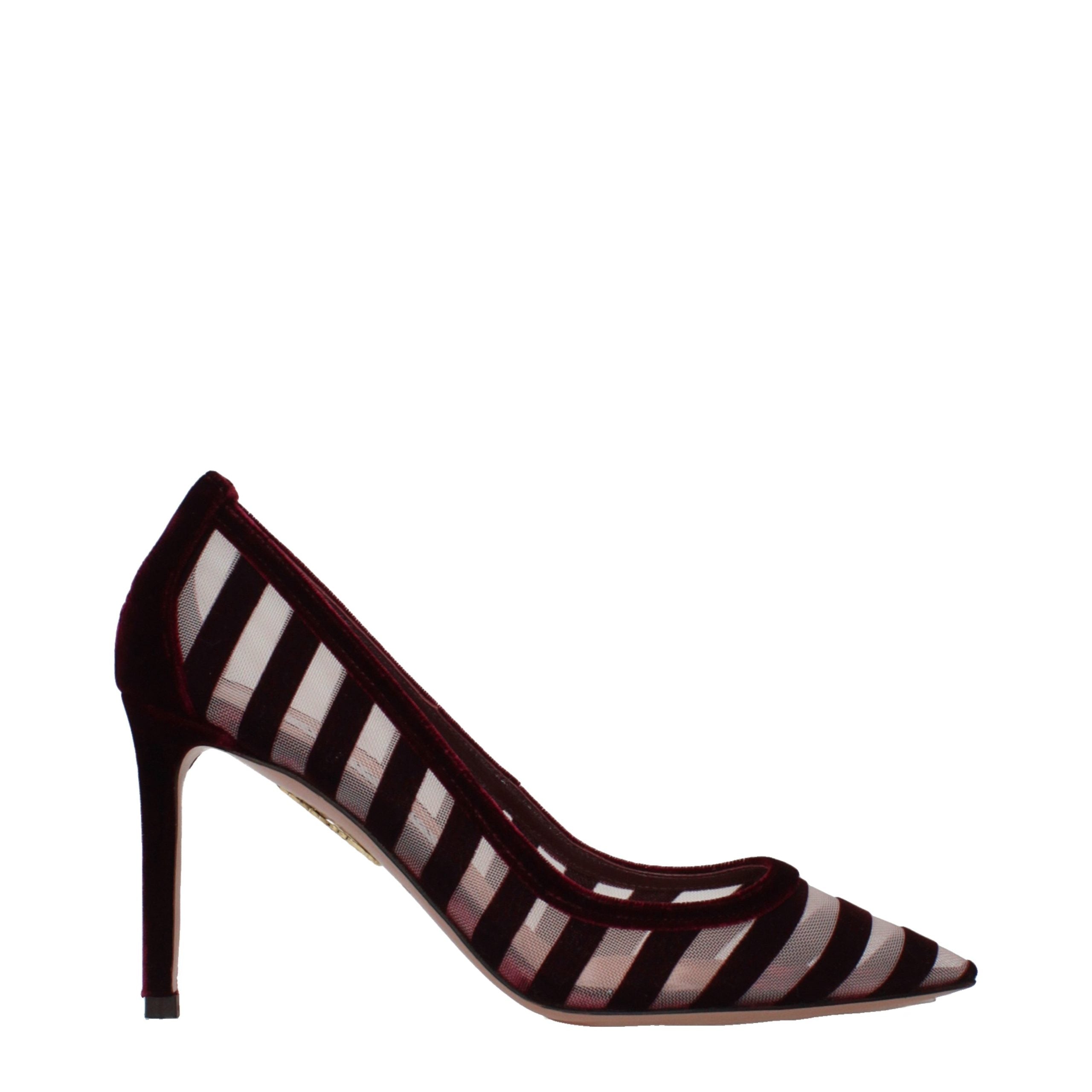 Experience the allure of Aquazzura's Transparent Velvet Mid Heel Pumps, where exquisite craftsmanship meets timeless elegance, perfect for any sophisticated occasion.