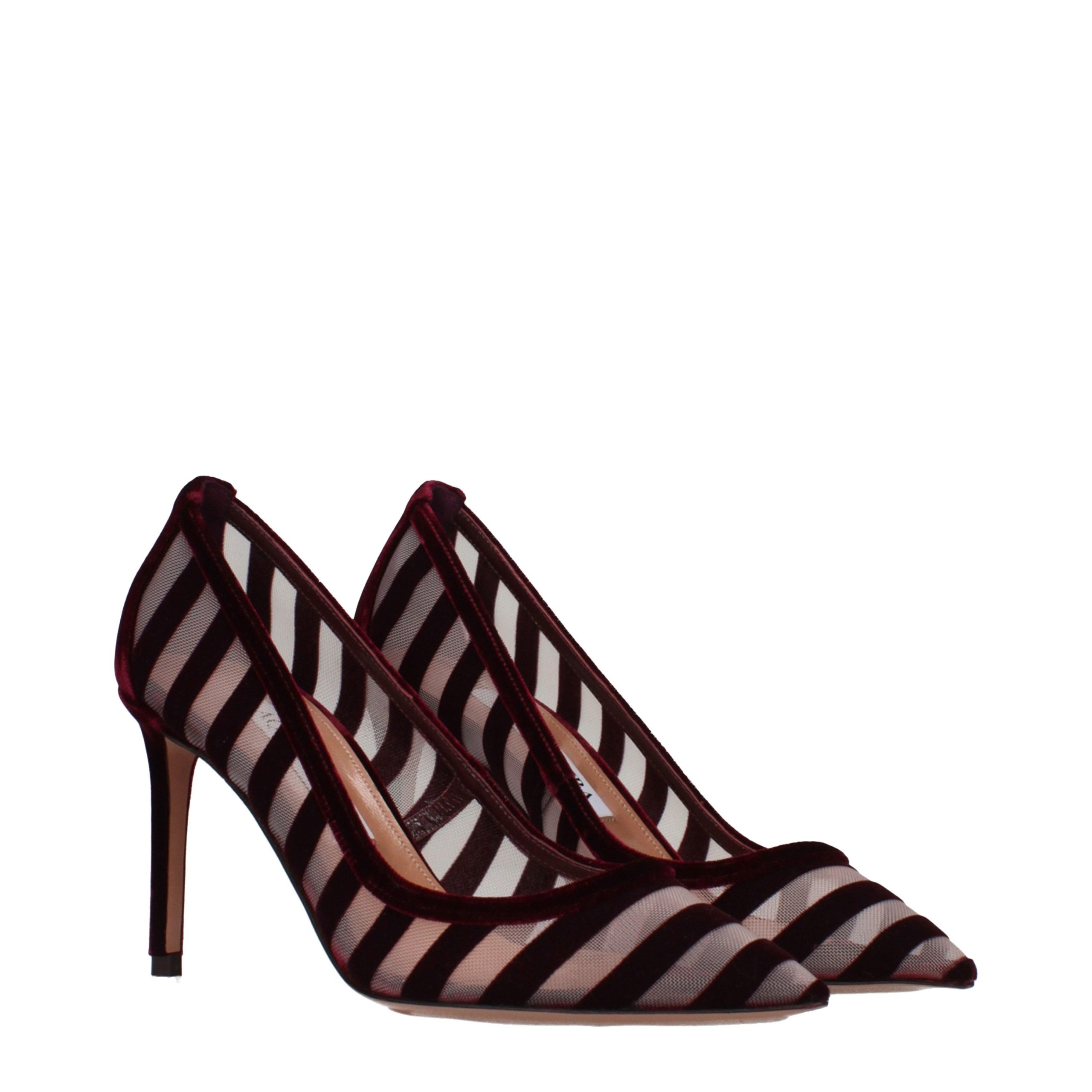 Experience the allure of Aquazzura's Transparent Velvet Mid Heel Pumps, where exquisite craftsmanship meets timeless elegance, perfect for the discerning connoisseur.