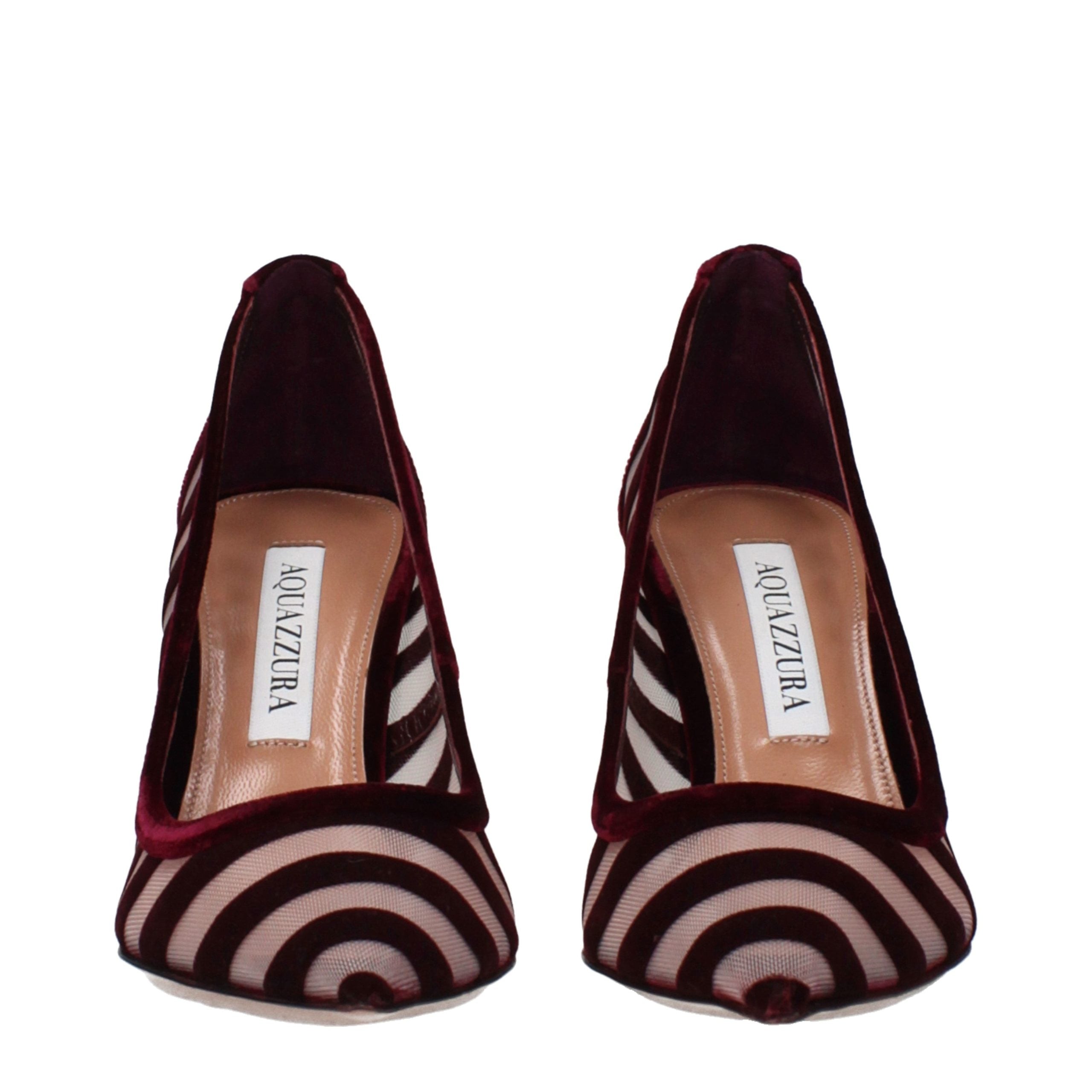 Elevate your elegance with Aquazzura's Transparent Velvet Mid Heel Pumps, where exquisite craftsmanship meets timeless allure for the discerning connoisseur.