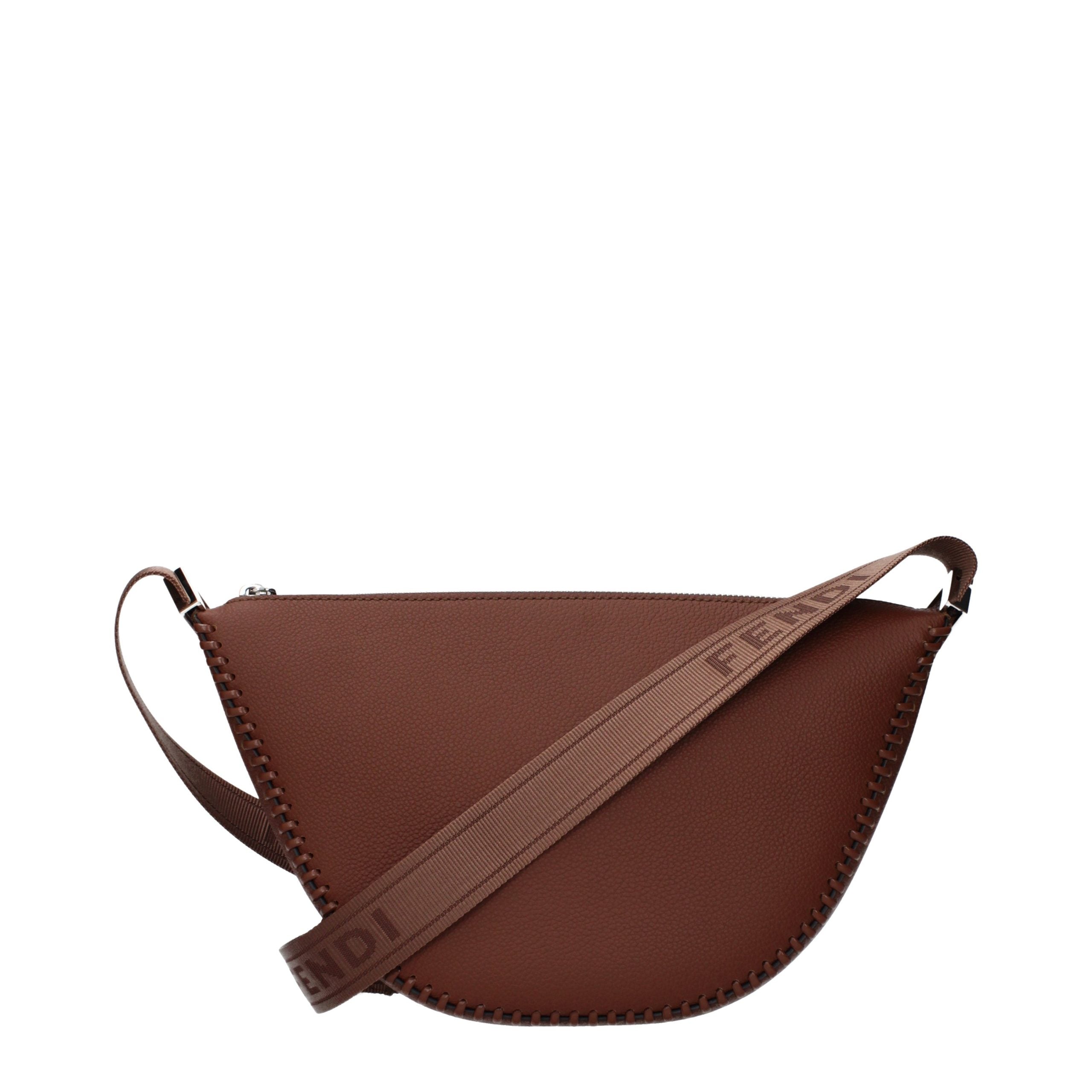 Indulge in the Fendi Brown Leather Crossbody Bag, a masterpiece of Italian craftsmanship that exudes luxury and sophistication for every discerning individual.