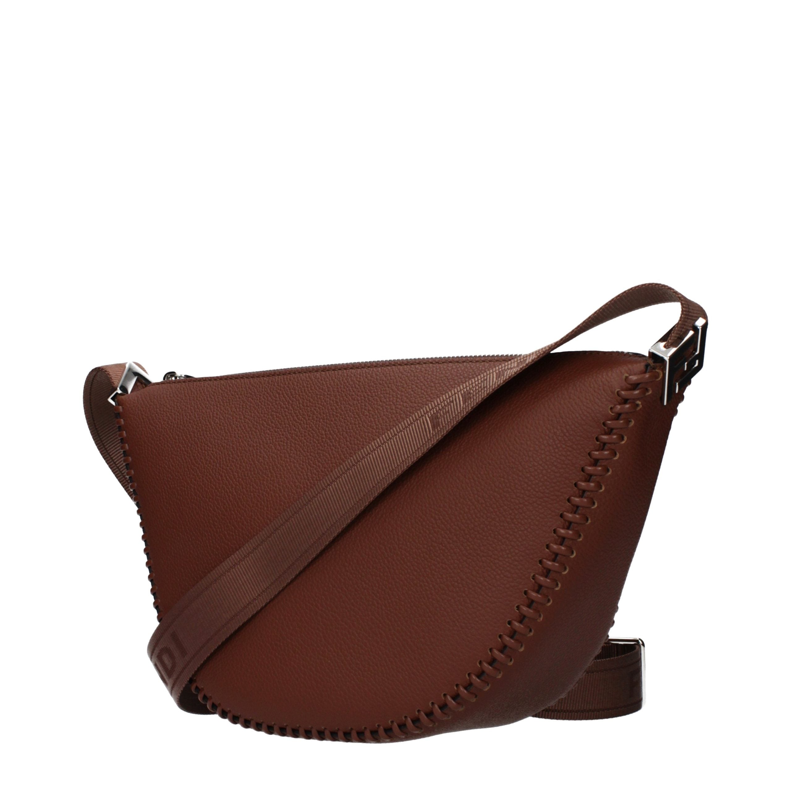 Indulge in the Fendi Brown Leather Crossbody Bag, a testament to Italian craftsmanship that elevates your style with timeless elegance and luxurious sophistication.