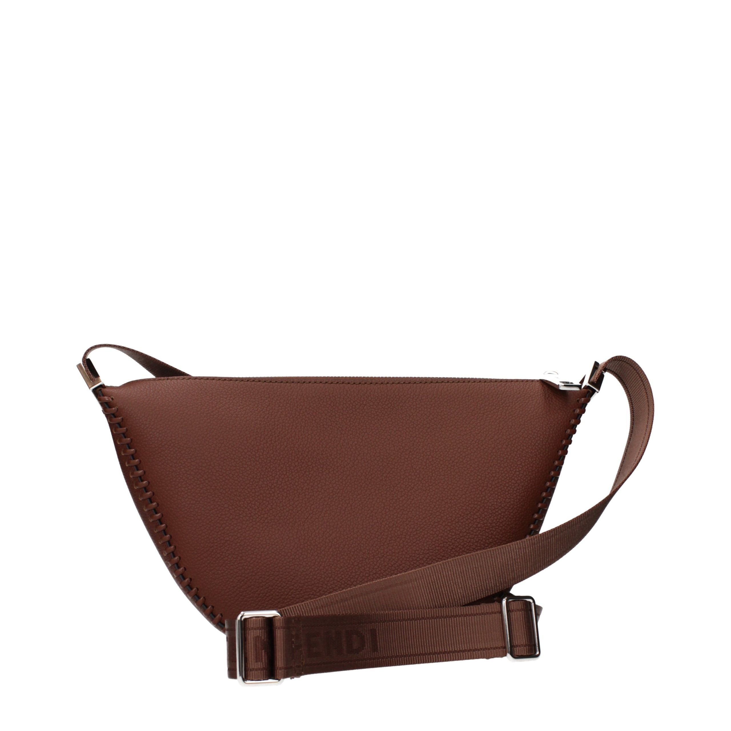 Indulge in the Fendi Brown Leather Crossbody Bag, a masterpiece of Italian craftsmanship that embodies timeless elegance and sophistication for every occasion.