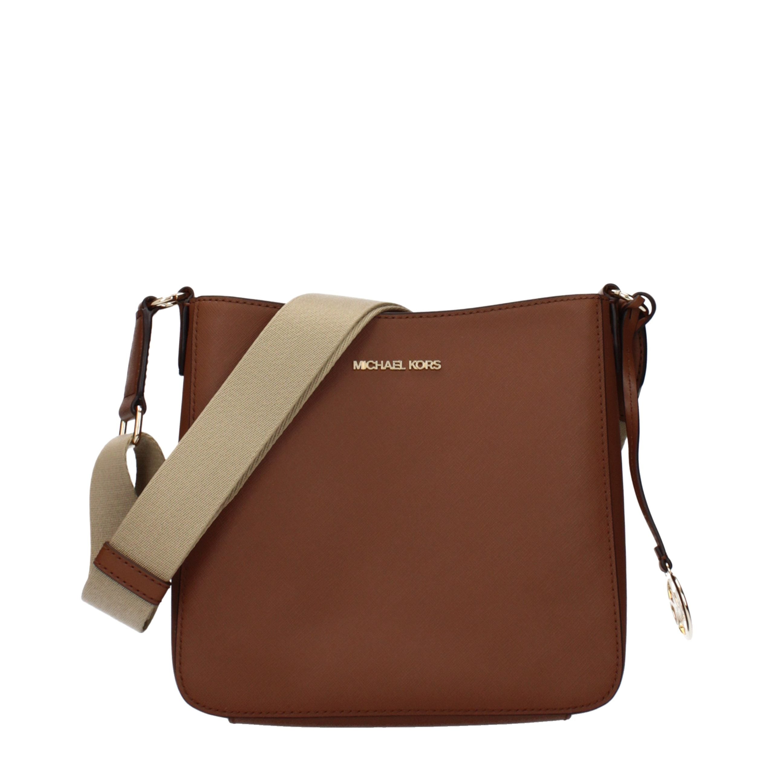 Elevate your elegance with the Michael Kors Brown Leather Shoulder Bag, a timeless accessory crafted from luxurious leather, perfect for every sophisticated occasion.