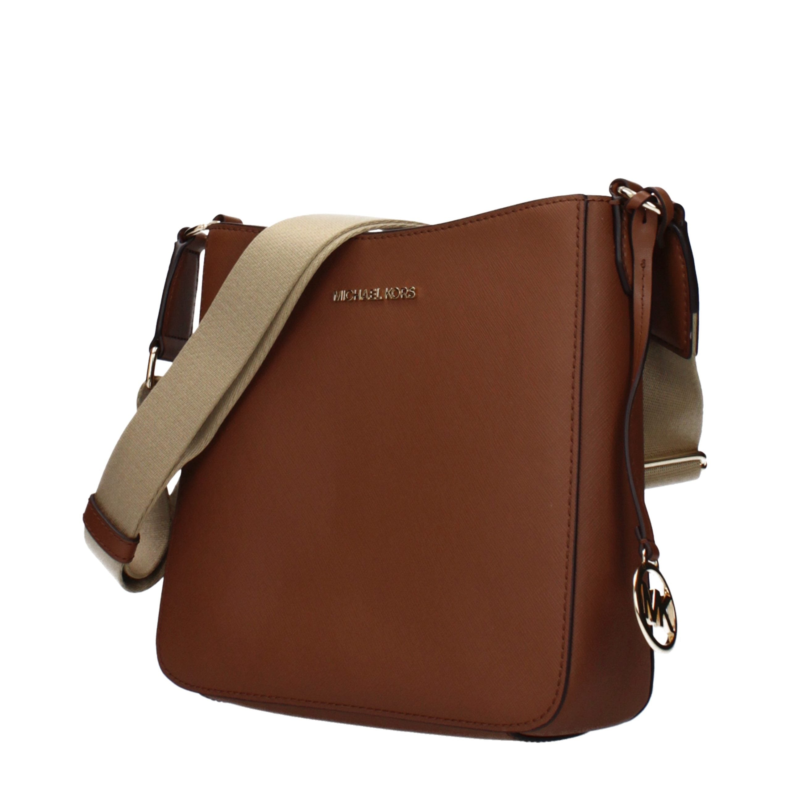Discover the Michael Kors Brown Leather Shoulder Bag, a masterpiece of artisanal luxury, blending timeless elegance with versatile sophistication for every occasion.