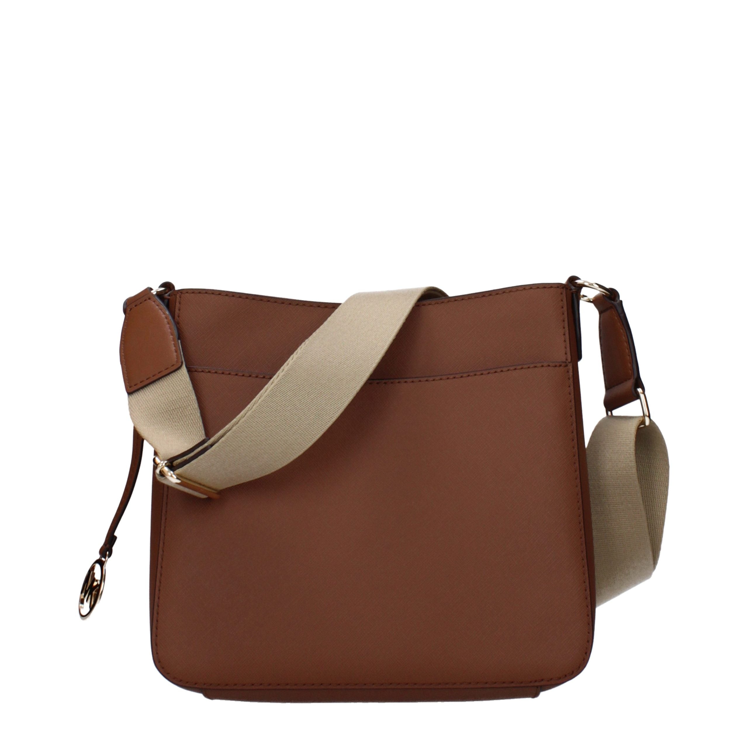 Elevate your elegance with the Michael Kors Brown Leather Shoulder Bag, a timeless accessory that embodies luxurious craftsmanship and versatile sophistication for every occasion.