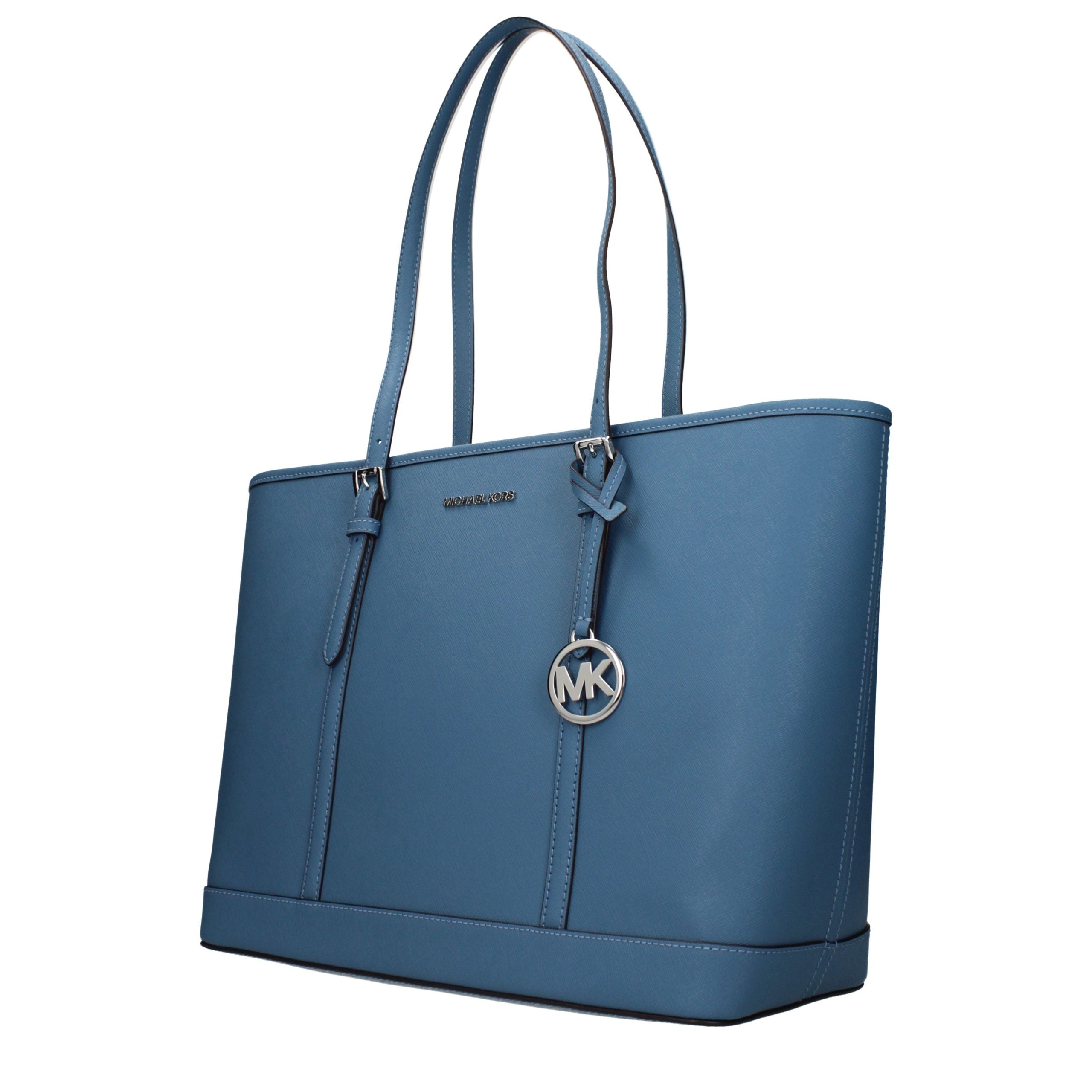 Discover the Michael Kors Blue Leather Shoulder Bag, a luxurious statement piece that embodies exquisite craftsmanship and timeless elegance for the discerning fashion lover.