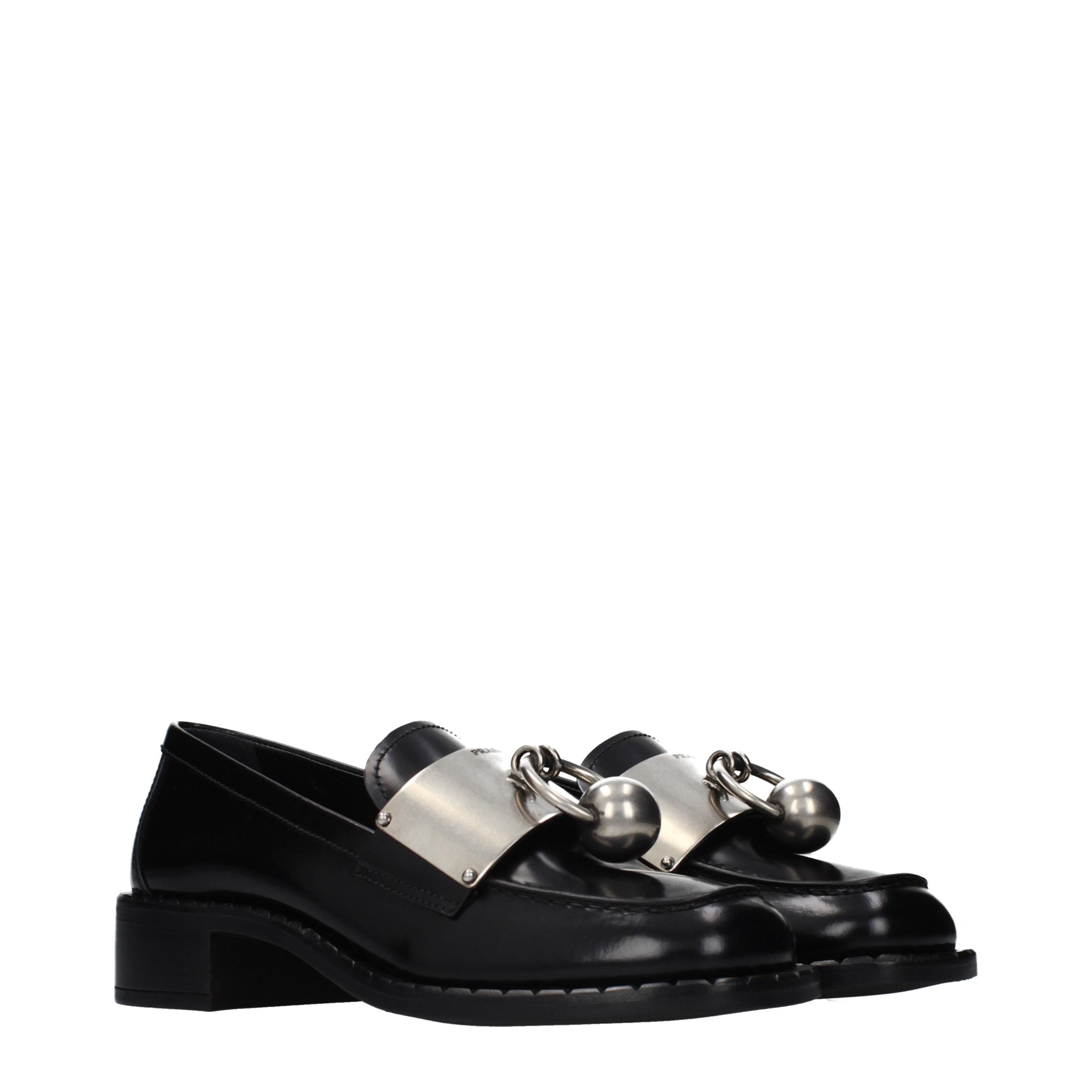 Experience the pinnacle of luxury with Prada Black Leather Slip-On Loafers, where exquisite craftsmanship meets timeless elegance for the discerning individual.