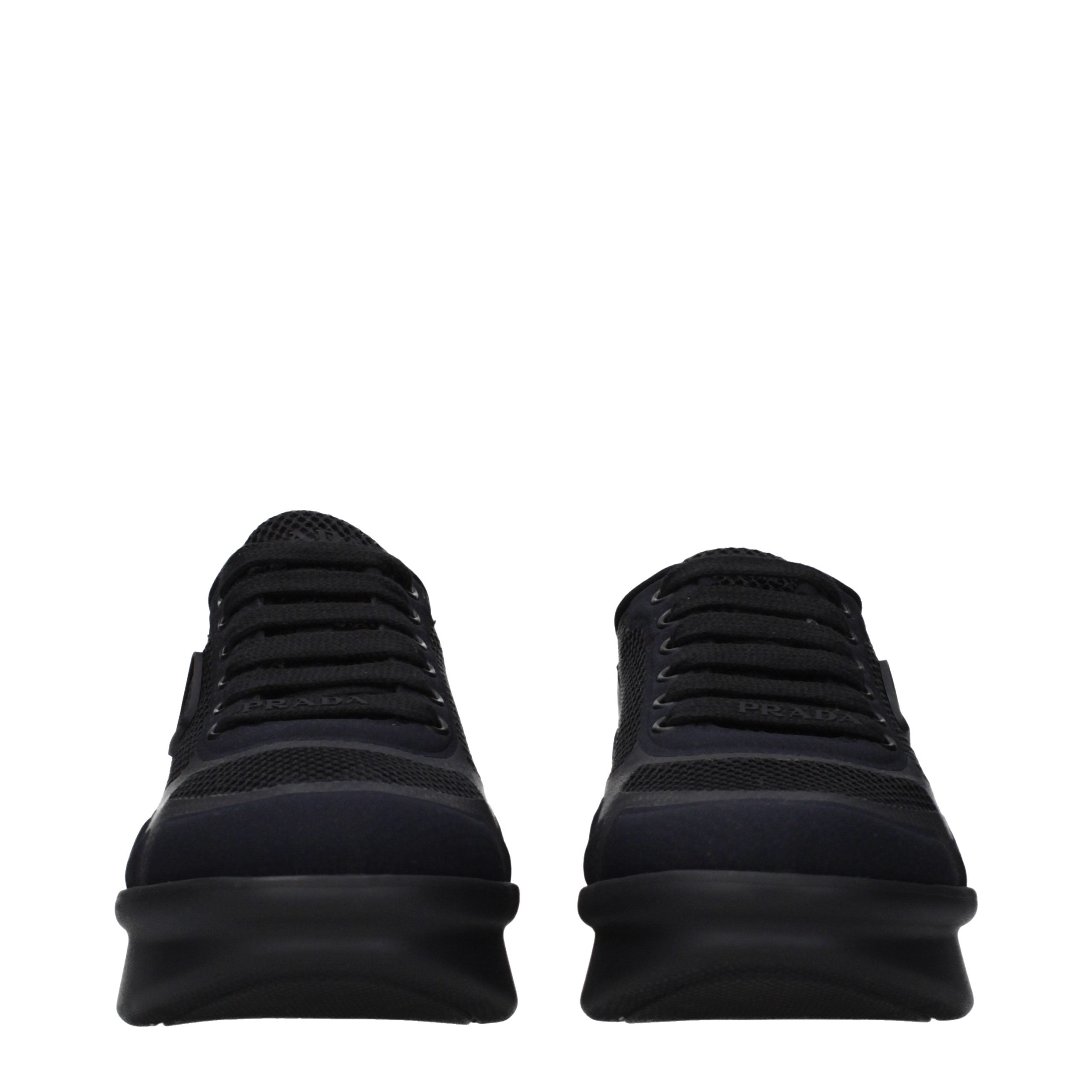 Elevate your style with Prada Black Fabric Low Top Sneakers, where exquisite craftsmanship meets timeless elegance, perfect for the discerning individual.