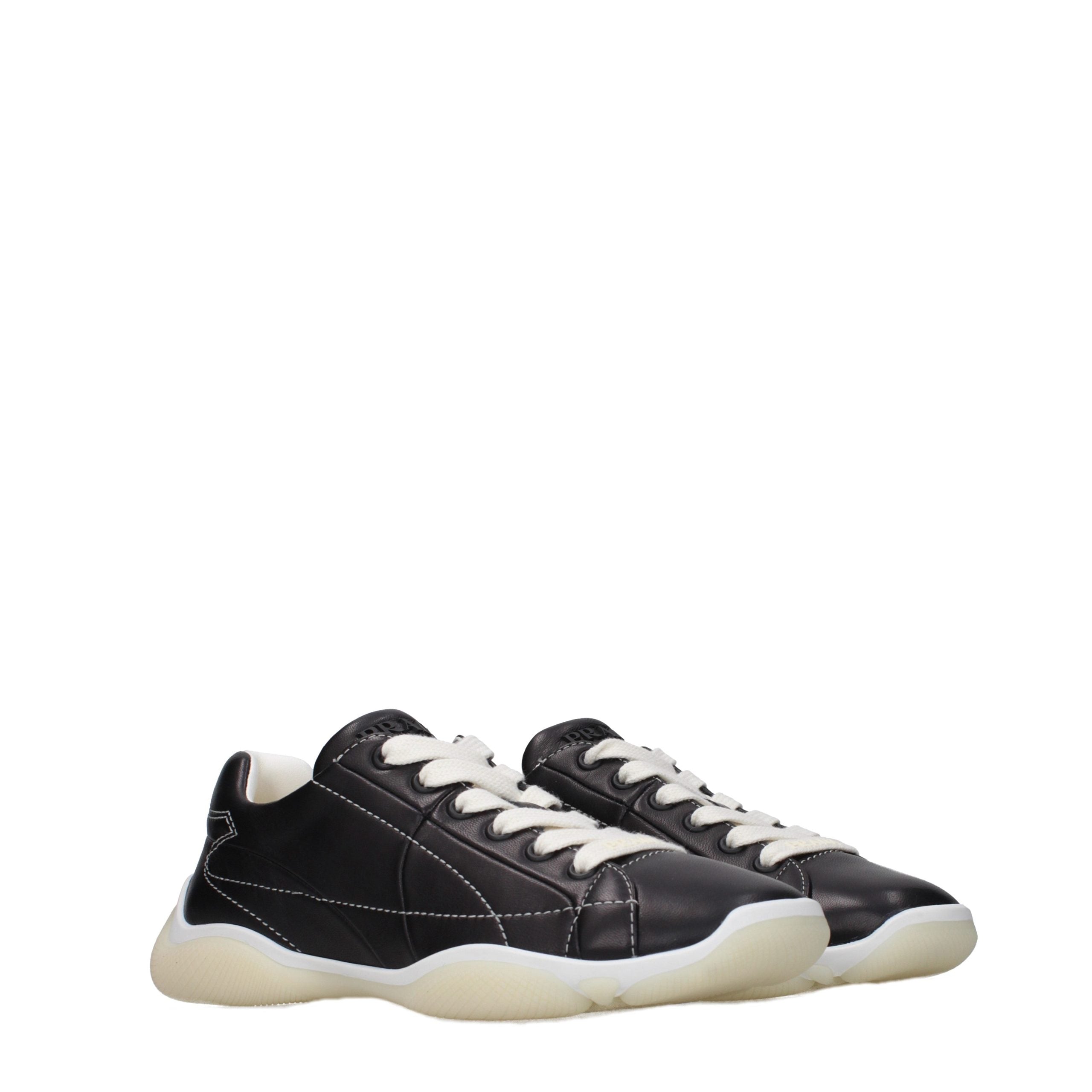 Indulge in the timeless elegance of Prada Black Leather Sneakers, where artisanal craftsmanship meets modern sophistication, elevating your style with luxurious allure.