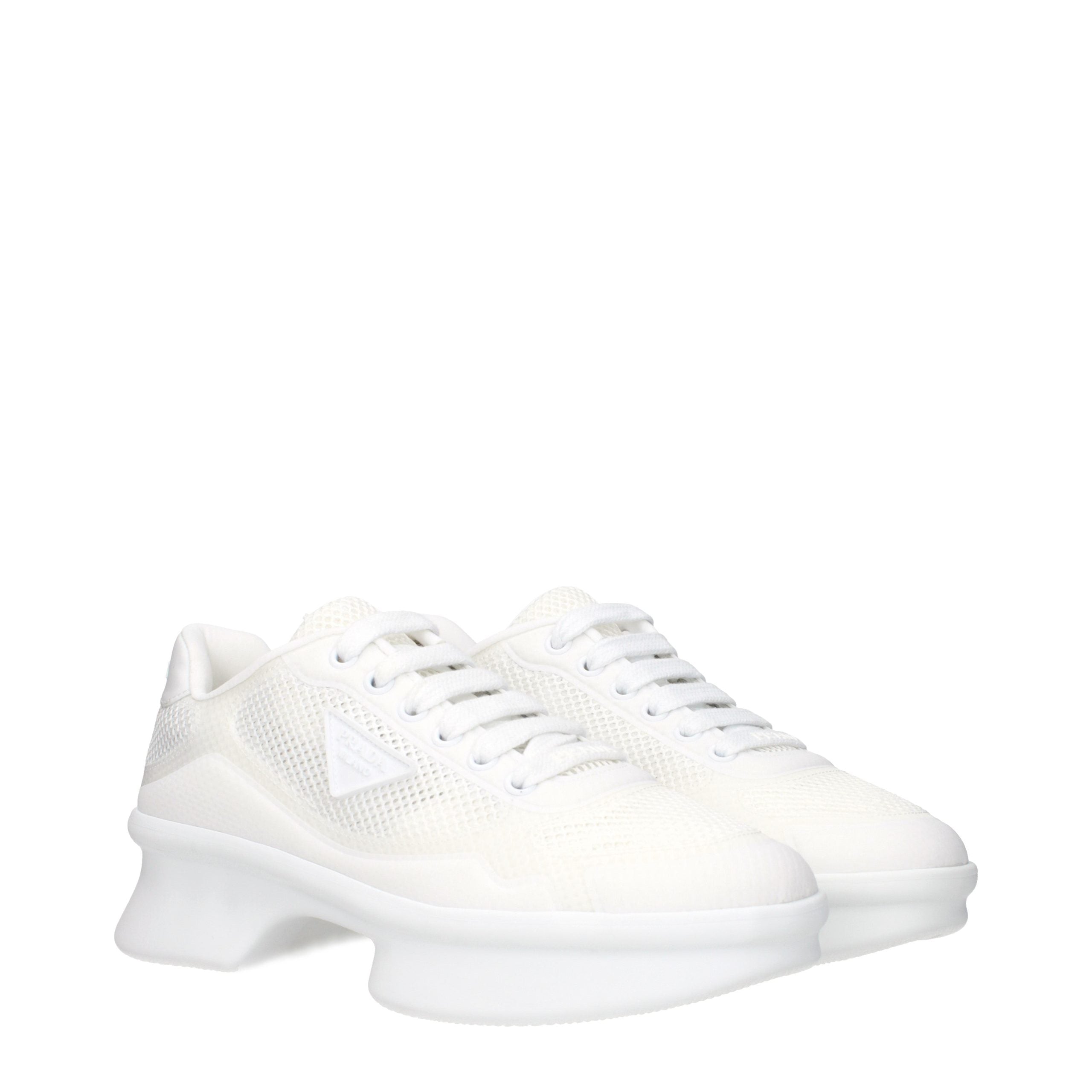 Indulge in the exquisite craftsmanship of Prada White Fabric Athletic Sneakers, where luxurious design meets unparalleled comfort for the discerning individual.