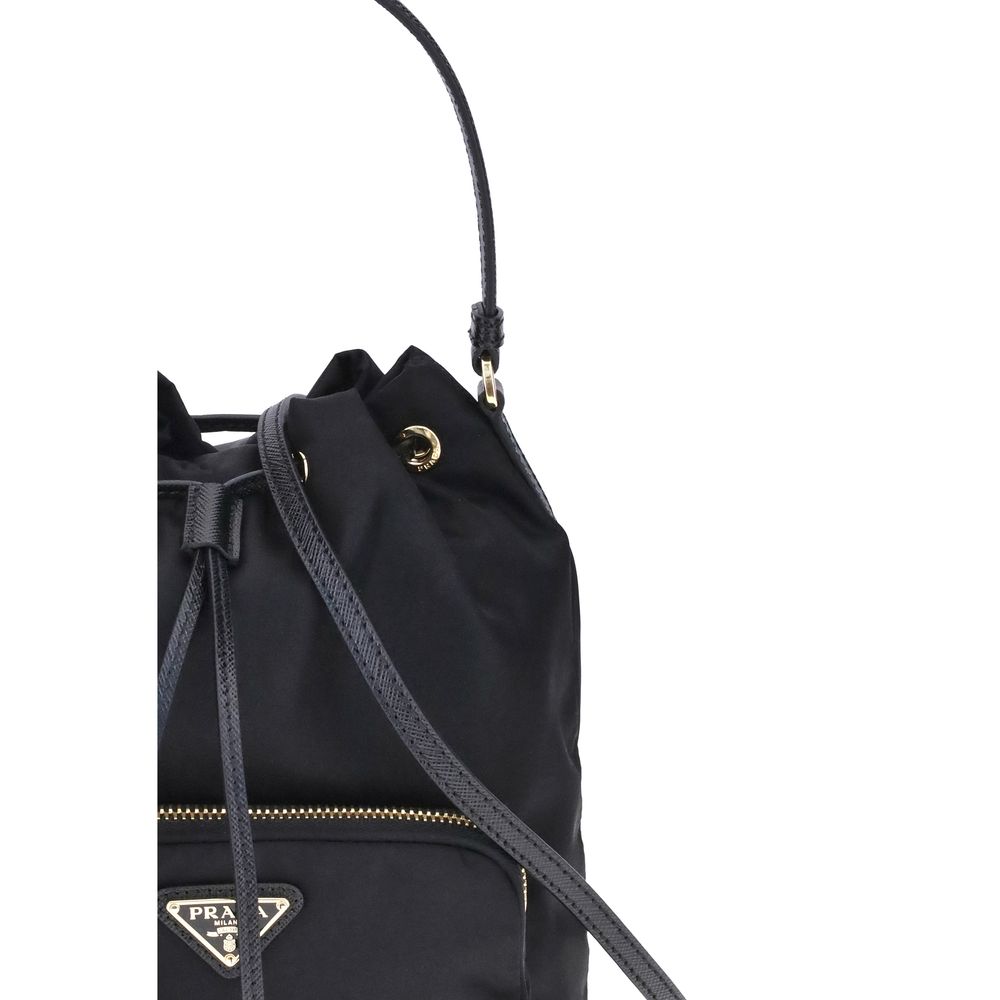 Elevate your style with the Prada Black Recycled Polyamide Bucket Bag, a masterpiece of sustainable elegance and artisanal craftsmanship for the discerning connoisseur.