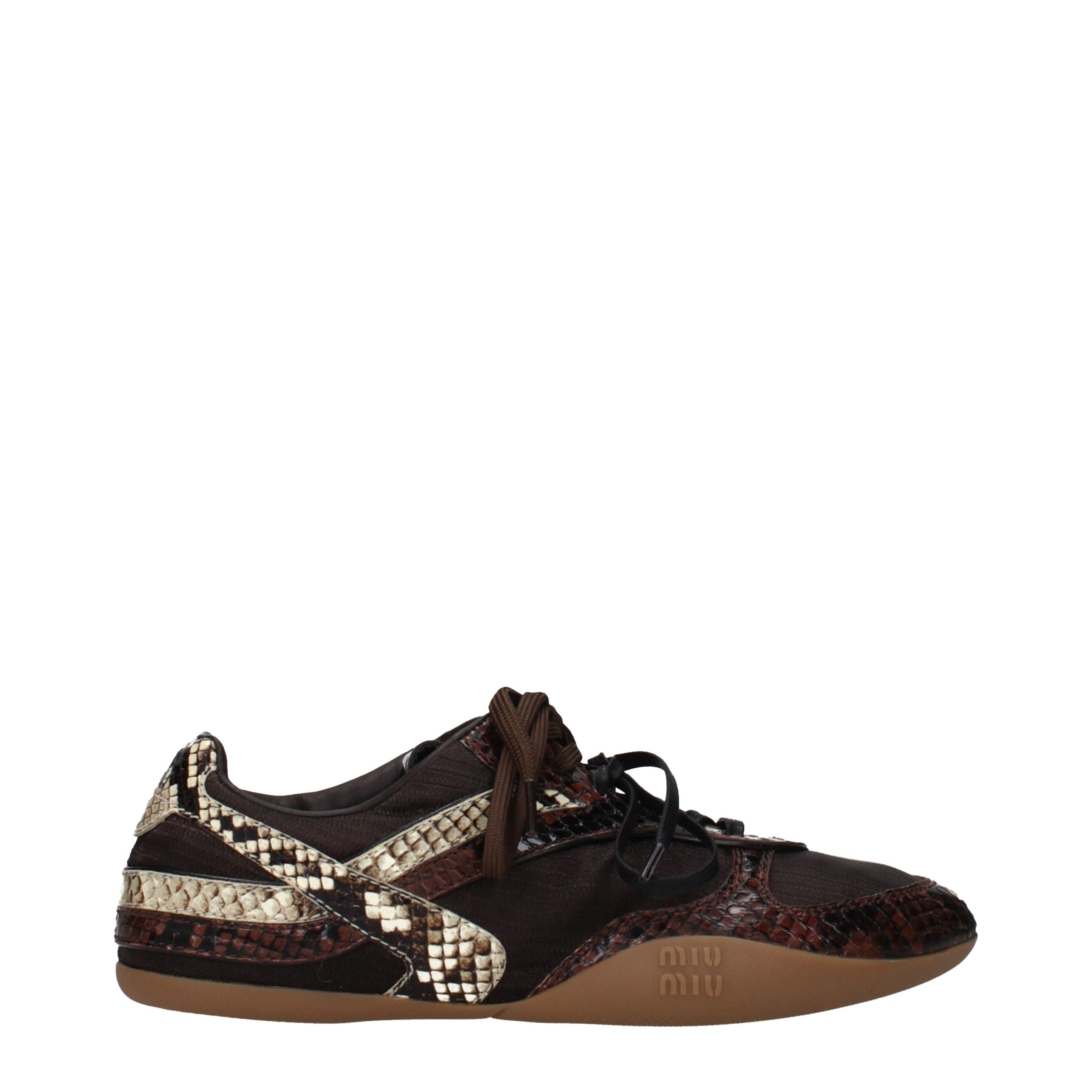Elevate your style with Miu Miu Brown Fabric Low Top Sneakers, where refined craftsmanship meets luxurious allure, perfect for the discerning fashion connoisseur.