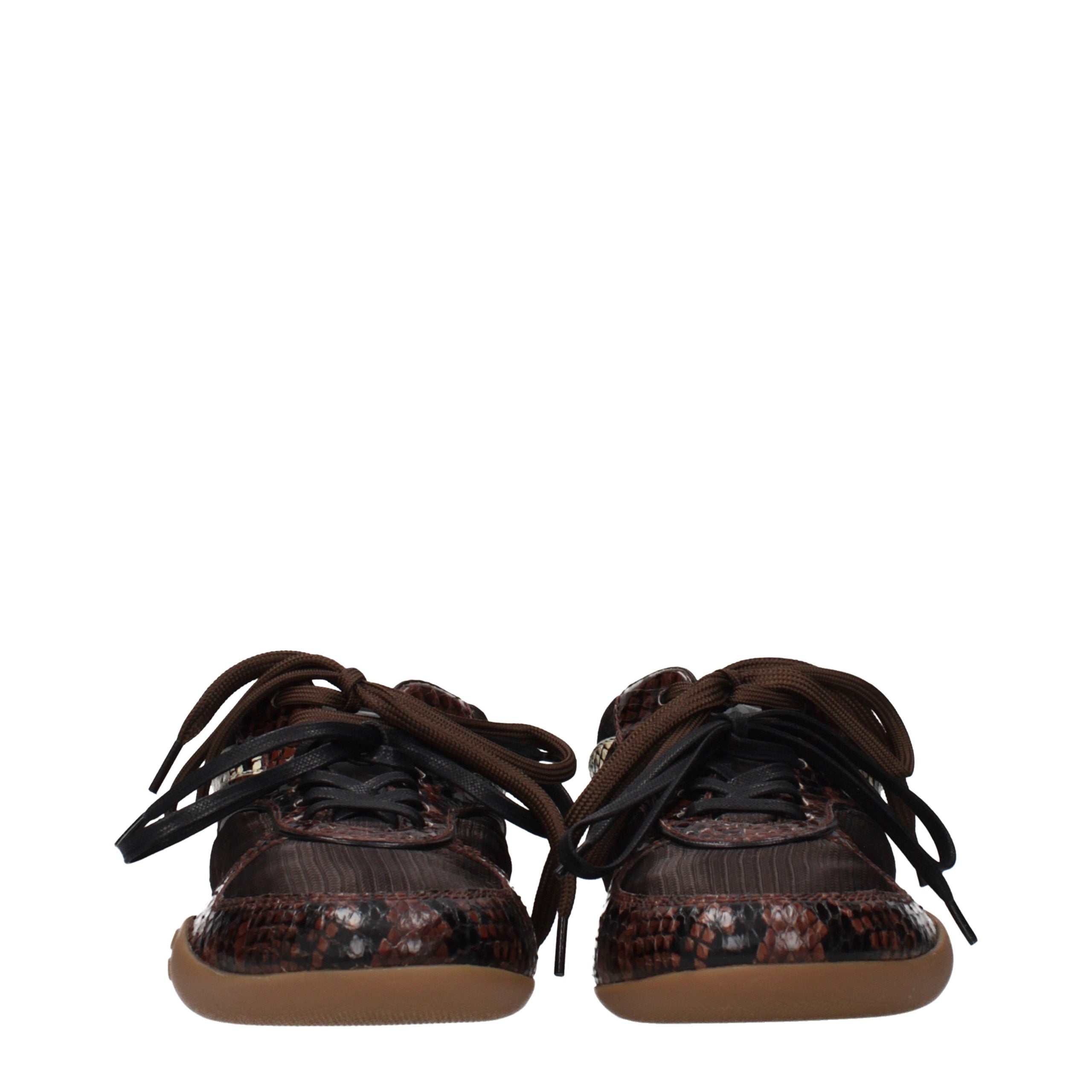 Experience the exquisite Miu Miu Brown Fabric Low Top Sneakers, where refined craftsmanship meets luxurious allure, perfect for the modern connoisseur.