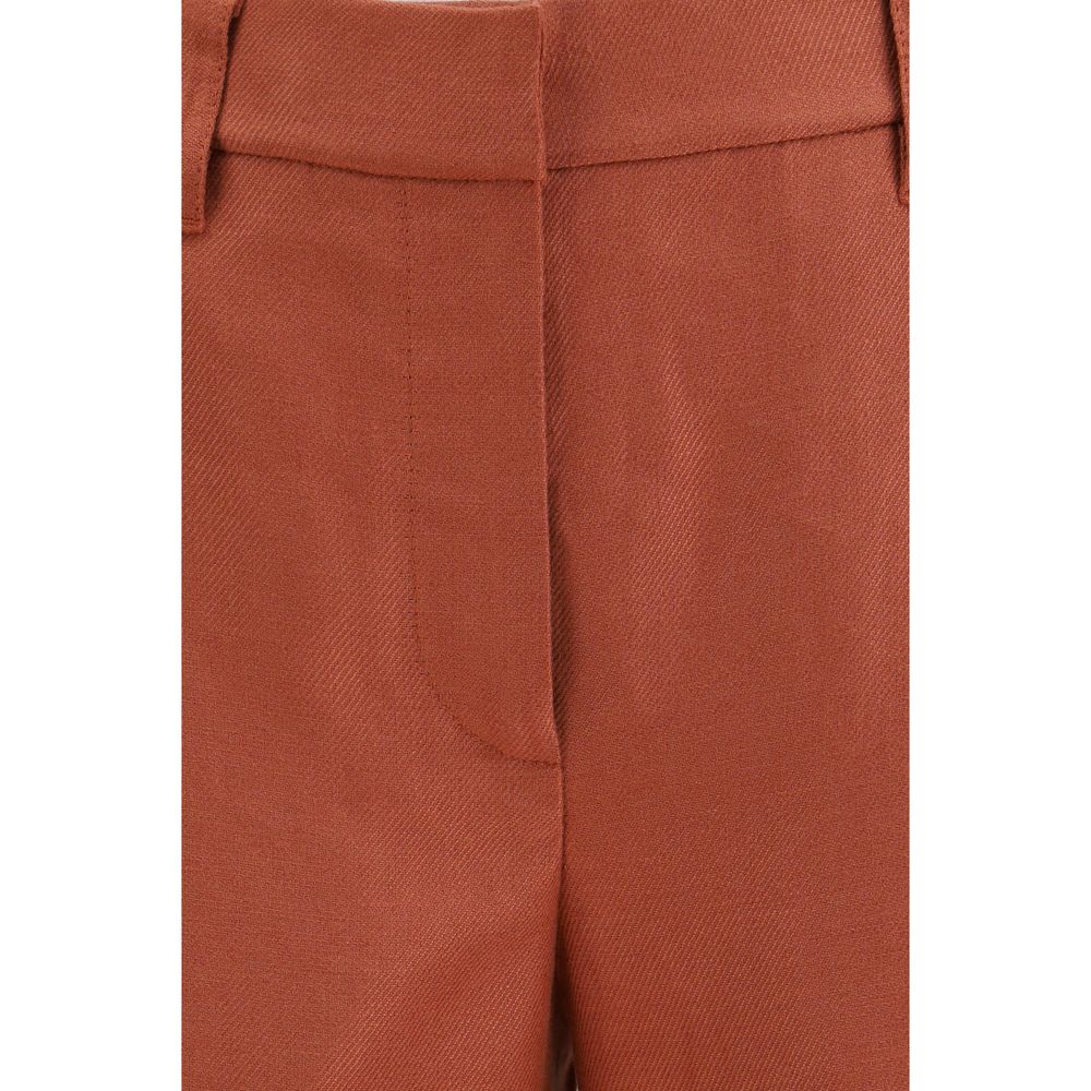 Discover the Brunello Cucinelli Multicolor Linen Casual Pants, a masterpiece of expert tailoring and luxurious 100% linen, perfect for effortless elegance in any setting.