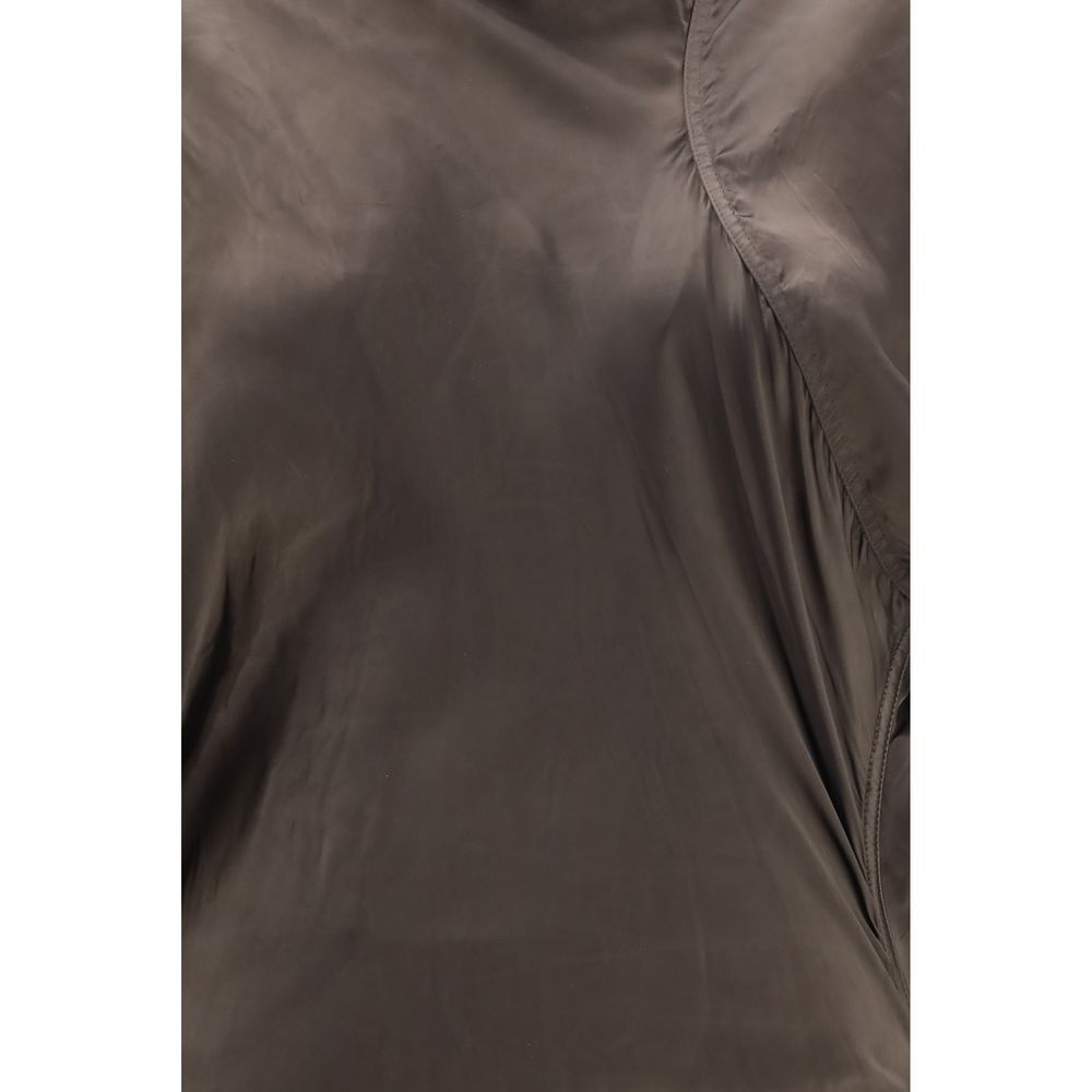Experience the allure of the Rick Owens Brown Copper Long Dress, crafted from luxurious cupro for a sculptural elegance that defines haute couture sophistication.