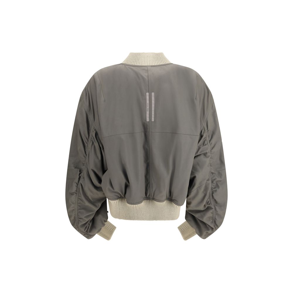 Experience the exquisite allure of the Rick Owens Beige Leather Jacket, a masterpiece of ultra-soft lamb leather that embodies gothic elegance and modern sophistication.