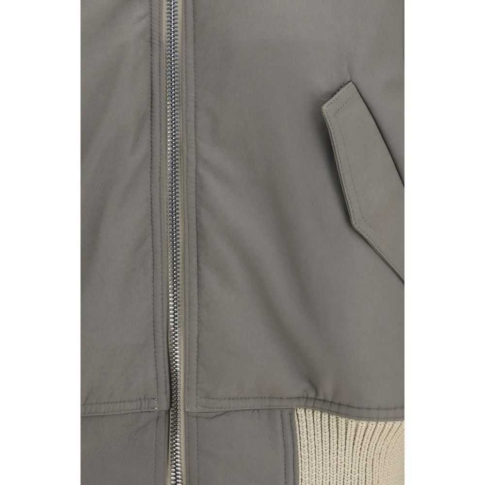 Elevate your style with the Rick Owens Beige Leather Jacket, a masterpiece of ultra-soft lamb leather that embodies gothic elegance and avant-garde sophistication.