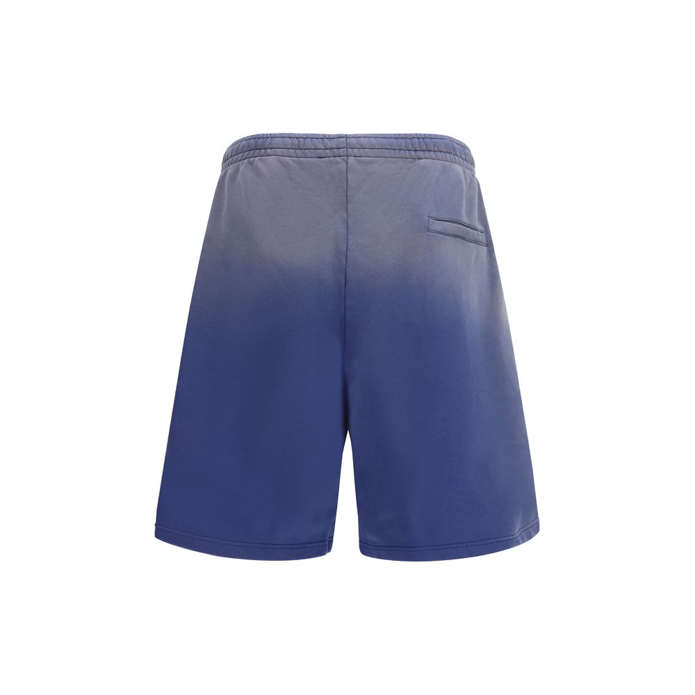 Elevate your wardrobe with Moschino Blue Cotton Bermuda Shorts, expertly crafted from premium cotton, embodying effortless elegance and luxurious comfort for the discerning individual.