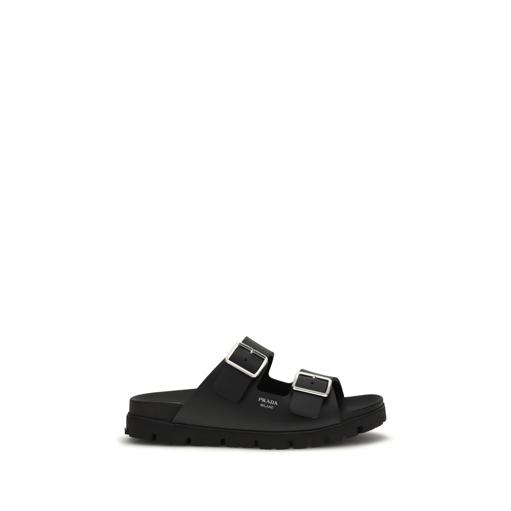 Indulge in the Prada Black Calf Leather Bos Taurus Sandals, where minimalist elegance meets expert craftsmanship, perfect for the discerning modern connoisseur.