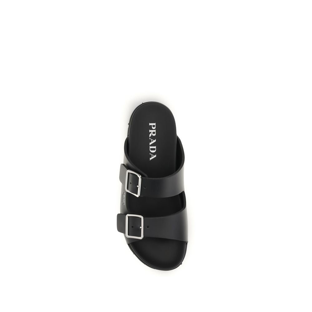 Indulge in the Prada Black Calf Leather Bos Taurus Sandals, where minimalist design meets unparalleled craftsmanship, perfect for elevating any luxurious ensemble.