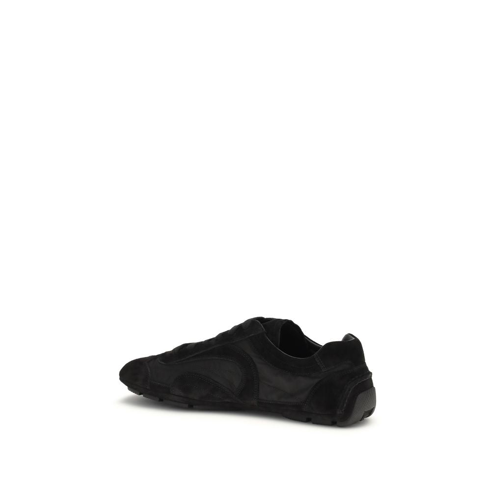 Elevate your style with Prada Black Calf Leather Bos Taurus Athletic Sneakers, where exquisite craftsmanship meets modern luxury for the discerning individual.