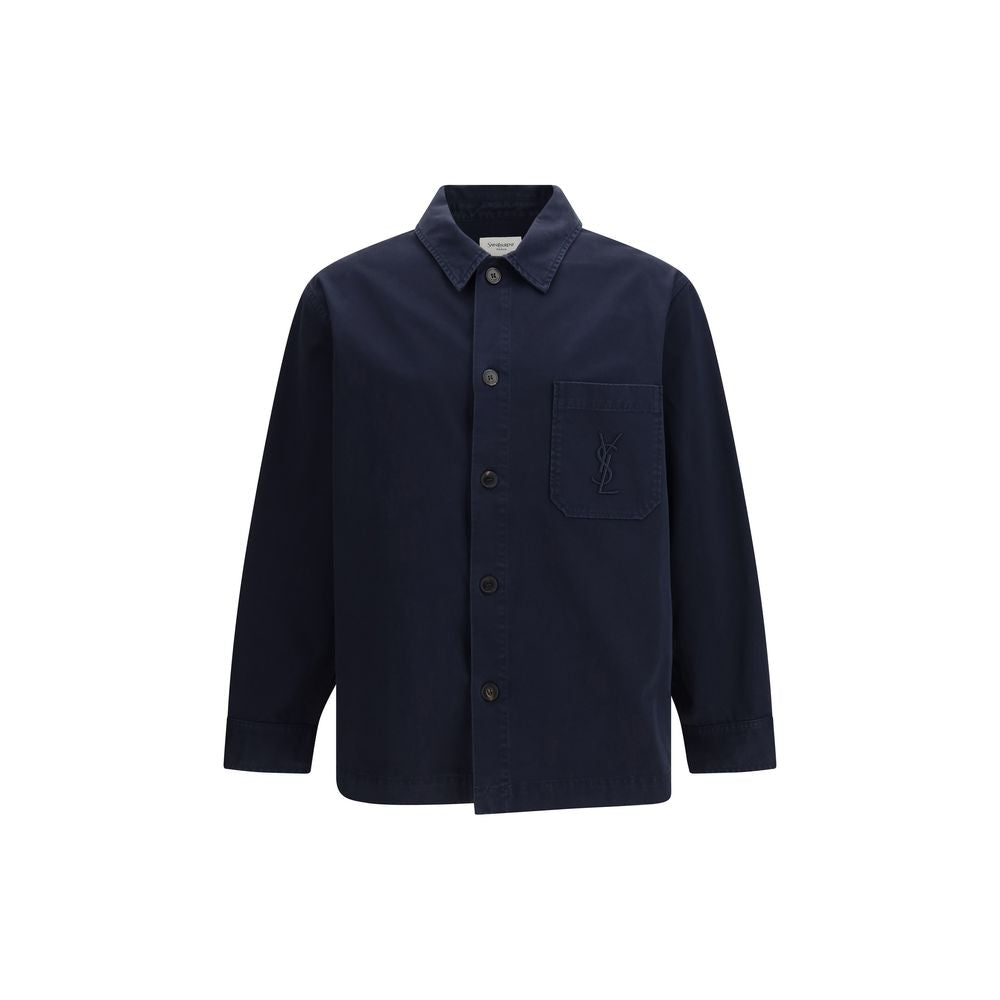Elevate your wardrobe with the Saint Laurent Blue Cotton Denim Jacket, a masterpiece of structured craftsmanship that embodies modern luxury and effortless sophistication.
