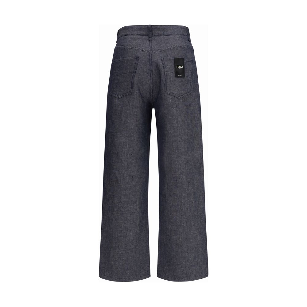 Discover the Fendi Blue Linen Relaxed Fit Jeans, a masterpiece of artisanal luxury blending linen and silk for effortless elegance in every moment.