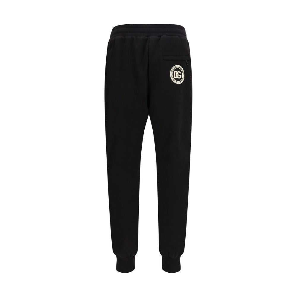 Indulge in the luxurious allure of Dolce & Gabbana Black Cotton Casual Pants, crafted for effortless elegance and timeless sophistication in every moment.
