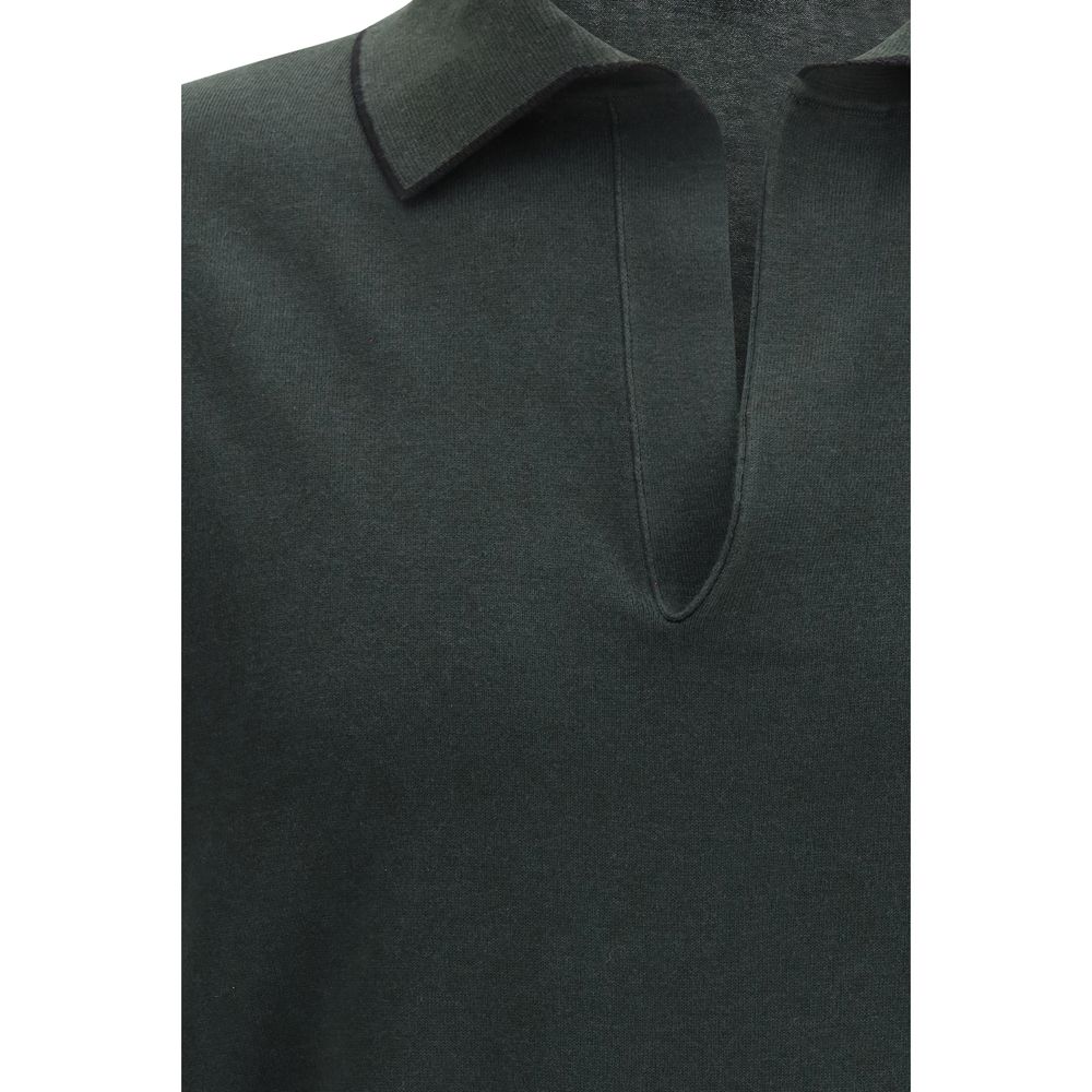 Indulge in the Tom Ford Bicolor Cotton Polo Shirt, a masterful blend of cotton and silk, embodying luxury and sophistication for the discerning individual.