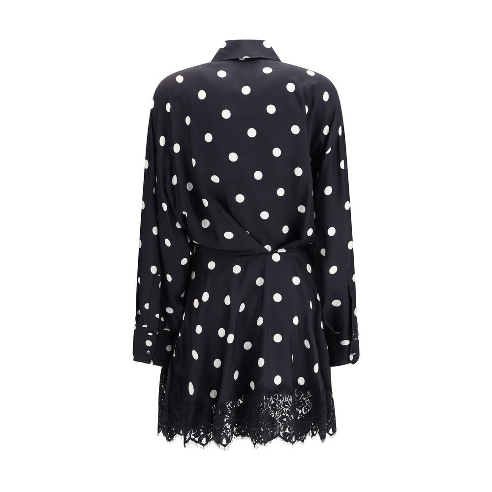 Experience the allure of the Max Mara Black Silk Casual Dress, a masterpiece of 100% silk and polka dot lace, embodying elegance for every occasion.